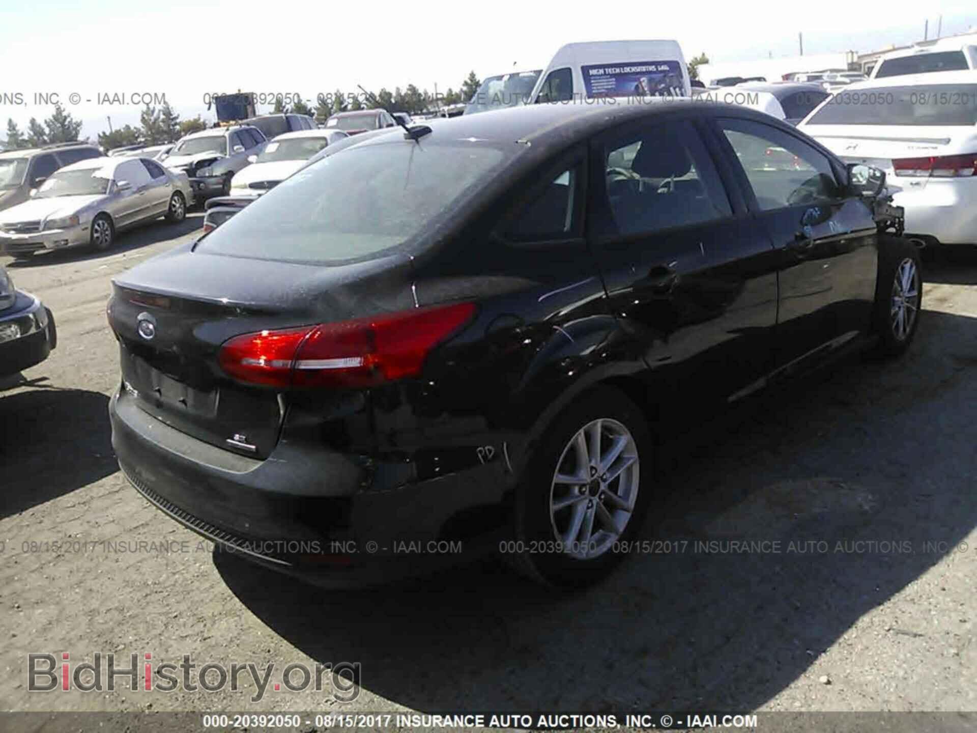 2015 Ford Focus - VIN: 1FADP3F21FL256460 - Photo 4