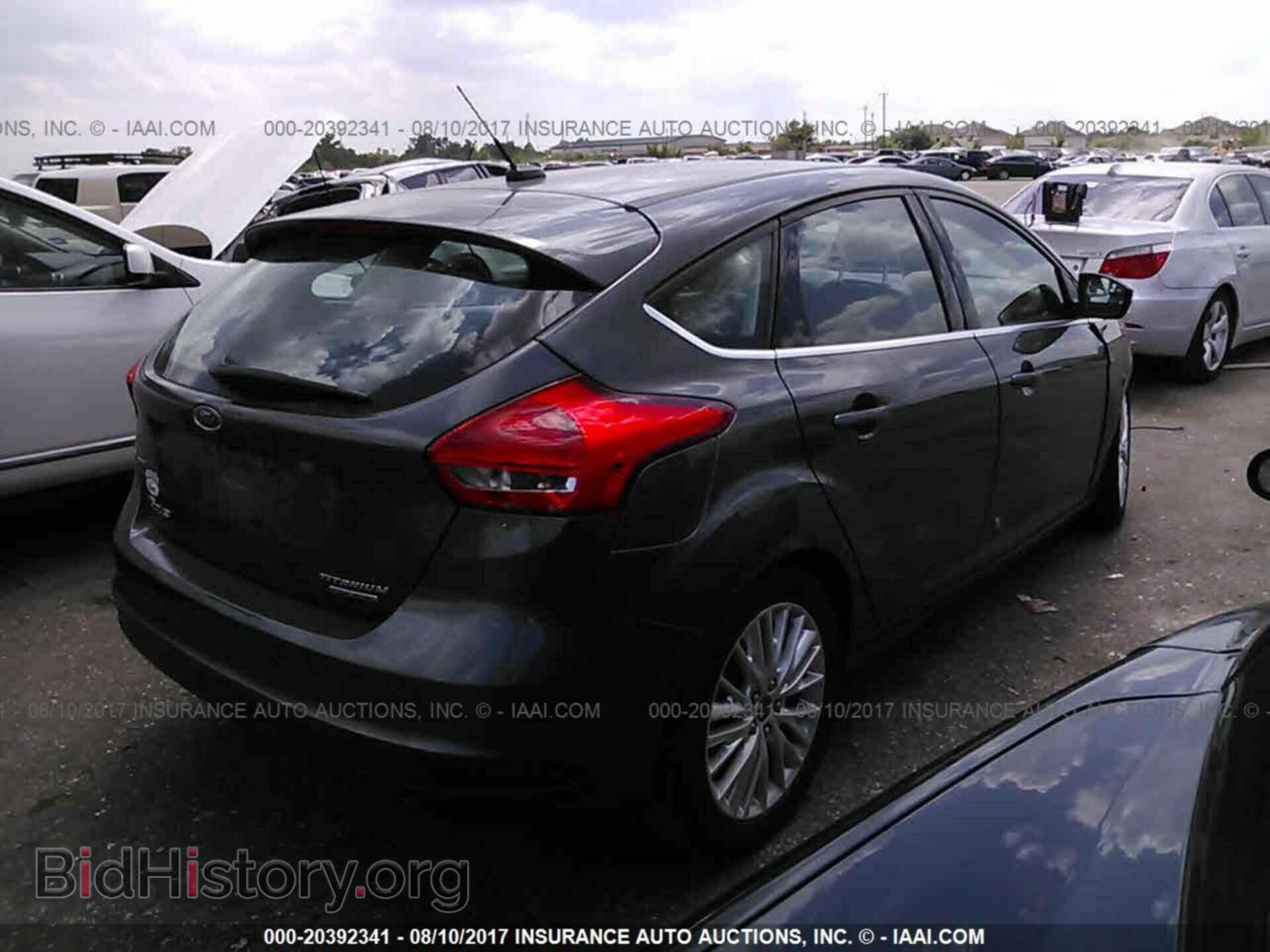 2015 Ford Focus - VIN: 1FADP3N28FL372529 - Photo 4