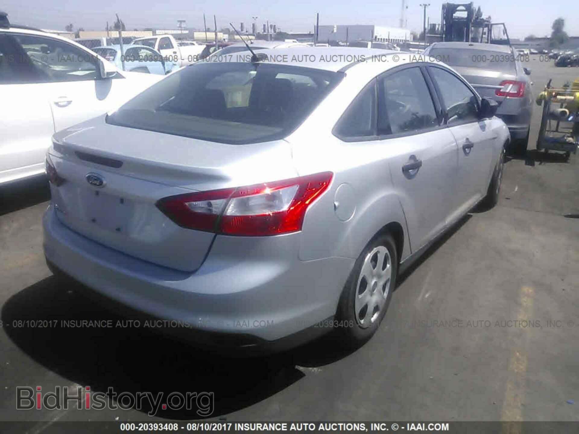 2014 Ford Focus - VIN: 1FADP3E23EL453937 - Фото 4