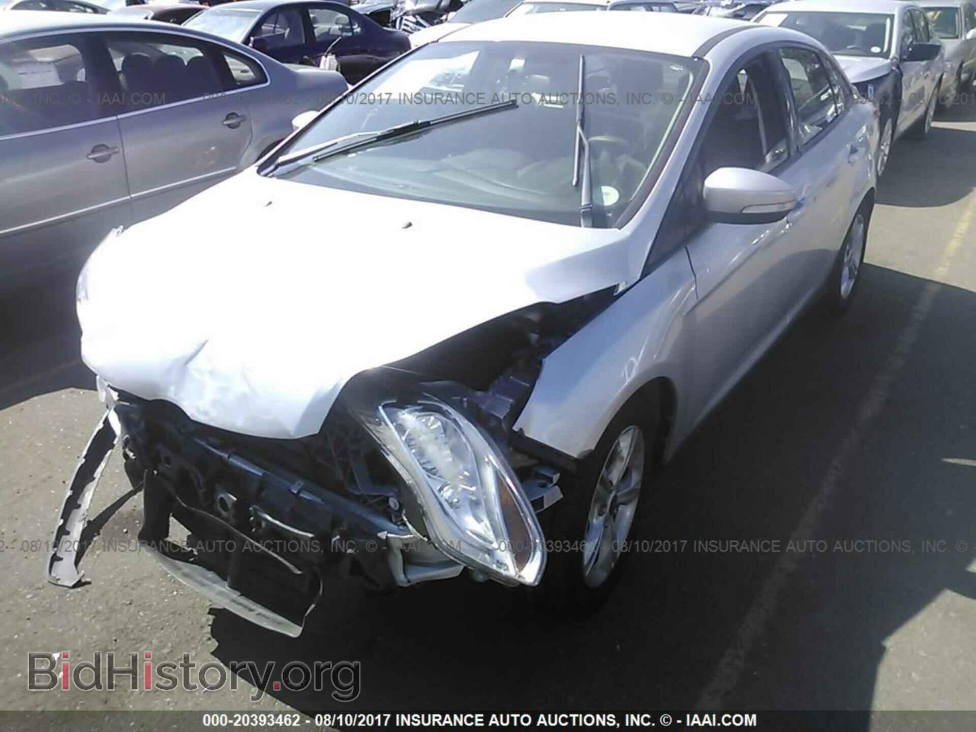 2014 Ford Focus - VIN: 1FADP3F23EL390739 - Фото 2