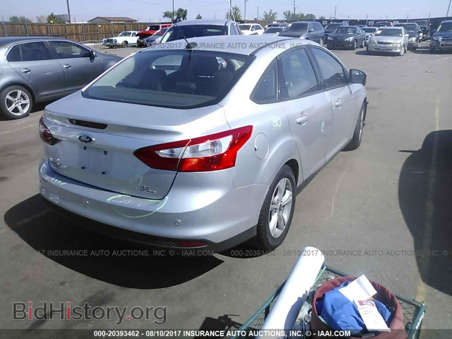 2014 Ford Focus - VIN: 1FADP3F23EL390739 - Фото 4
