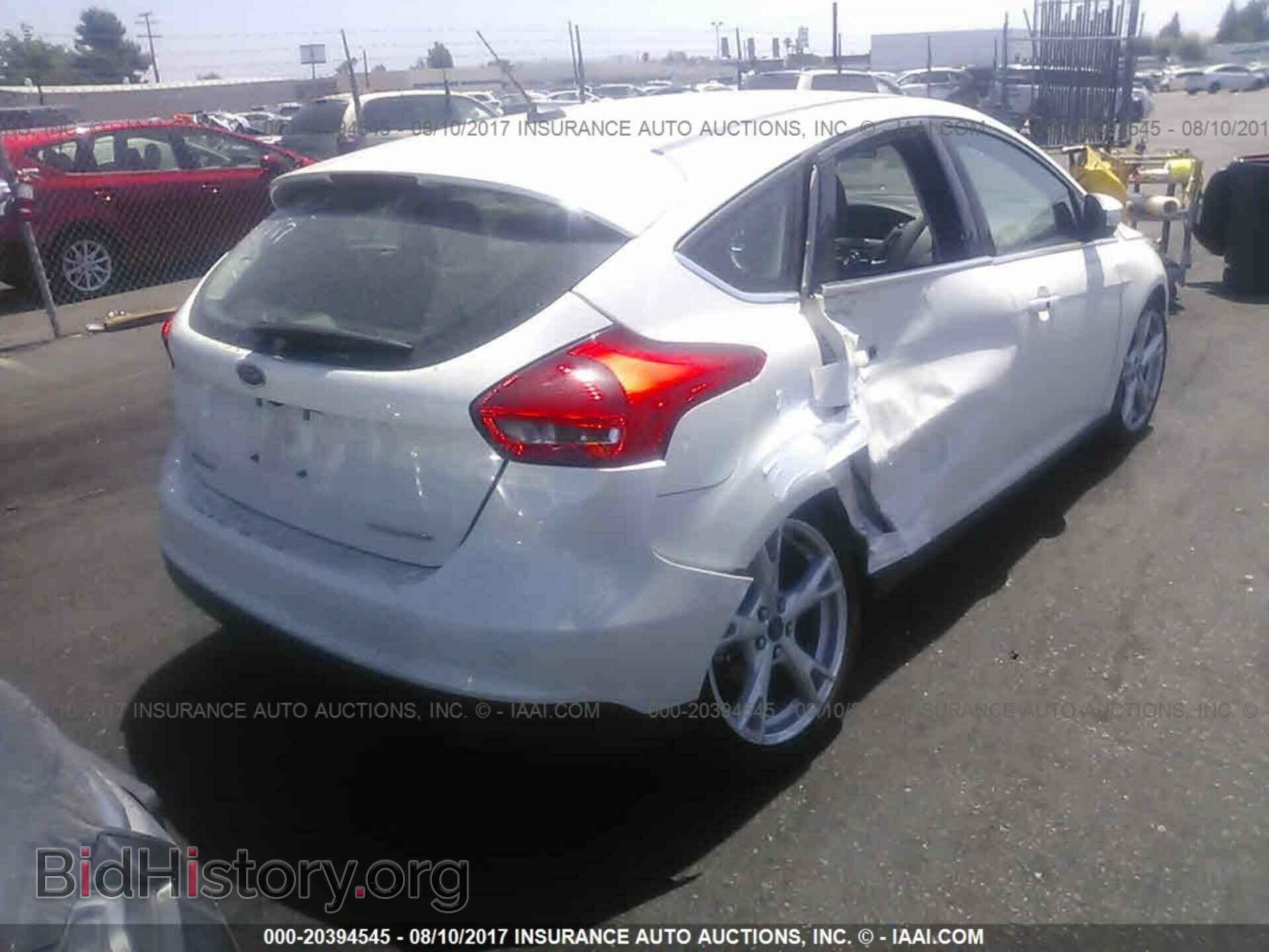 2015 Ford Focus - VIN: 1FADP3N24FL341469 - Photo 4