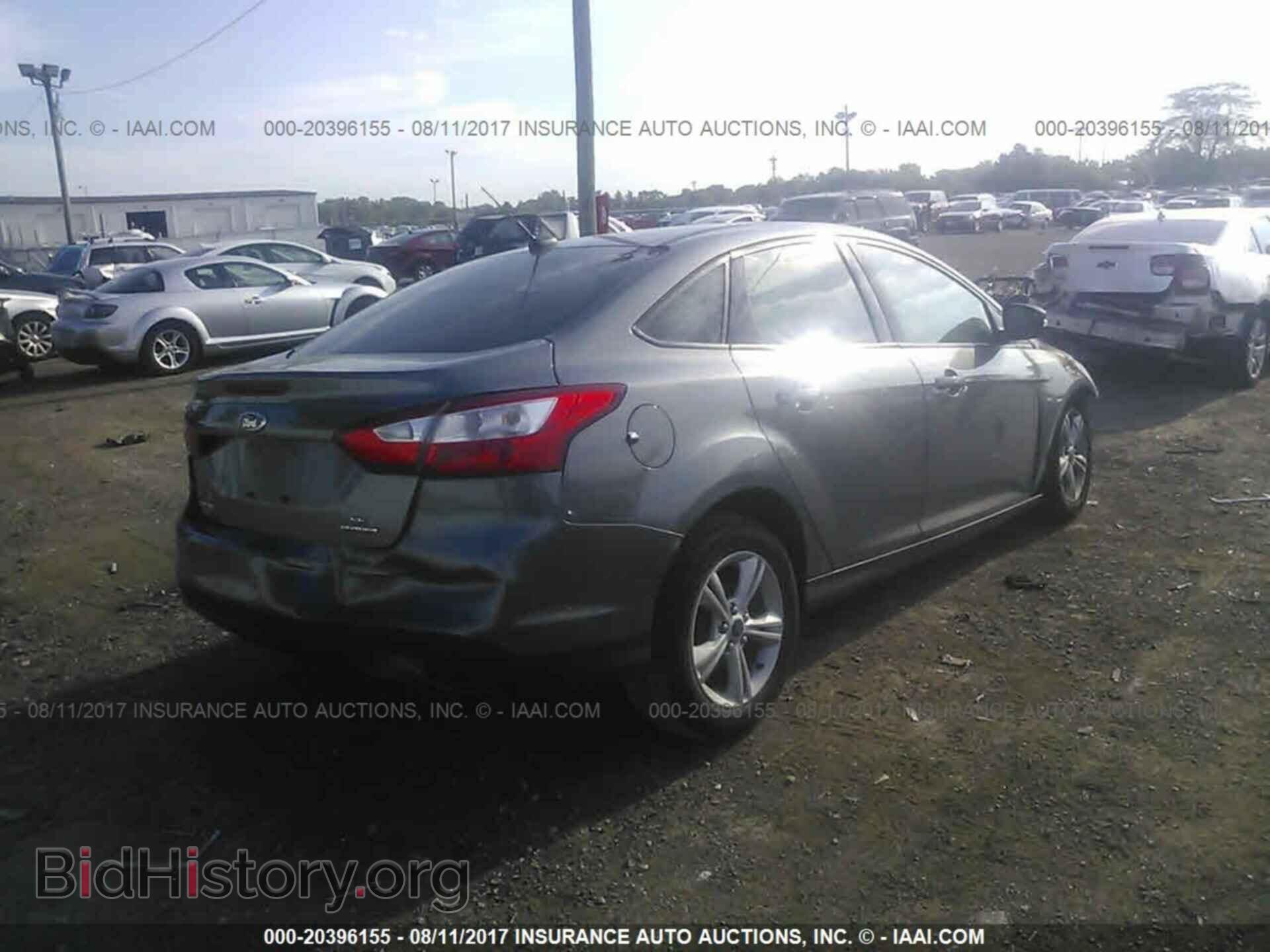 2014 Ford Focus - VIN: 1FADP3F22EL448792 - Фото 4