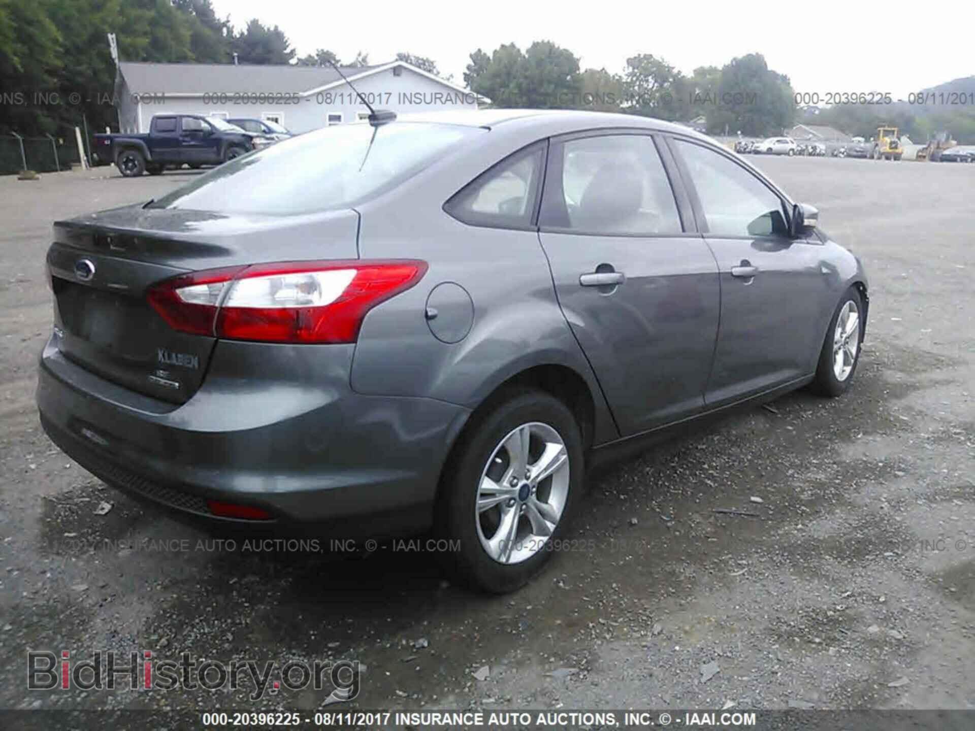 2013 Ford Focus - VIN: 1FADP3F28DL312472 - Фото 4