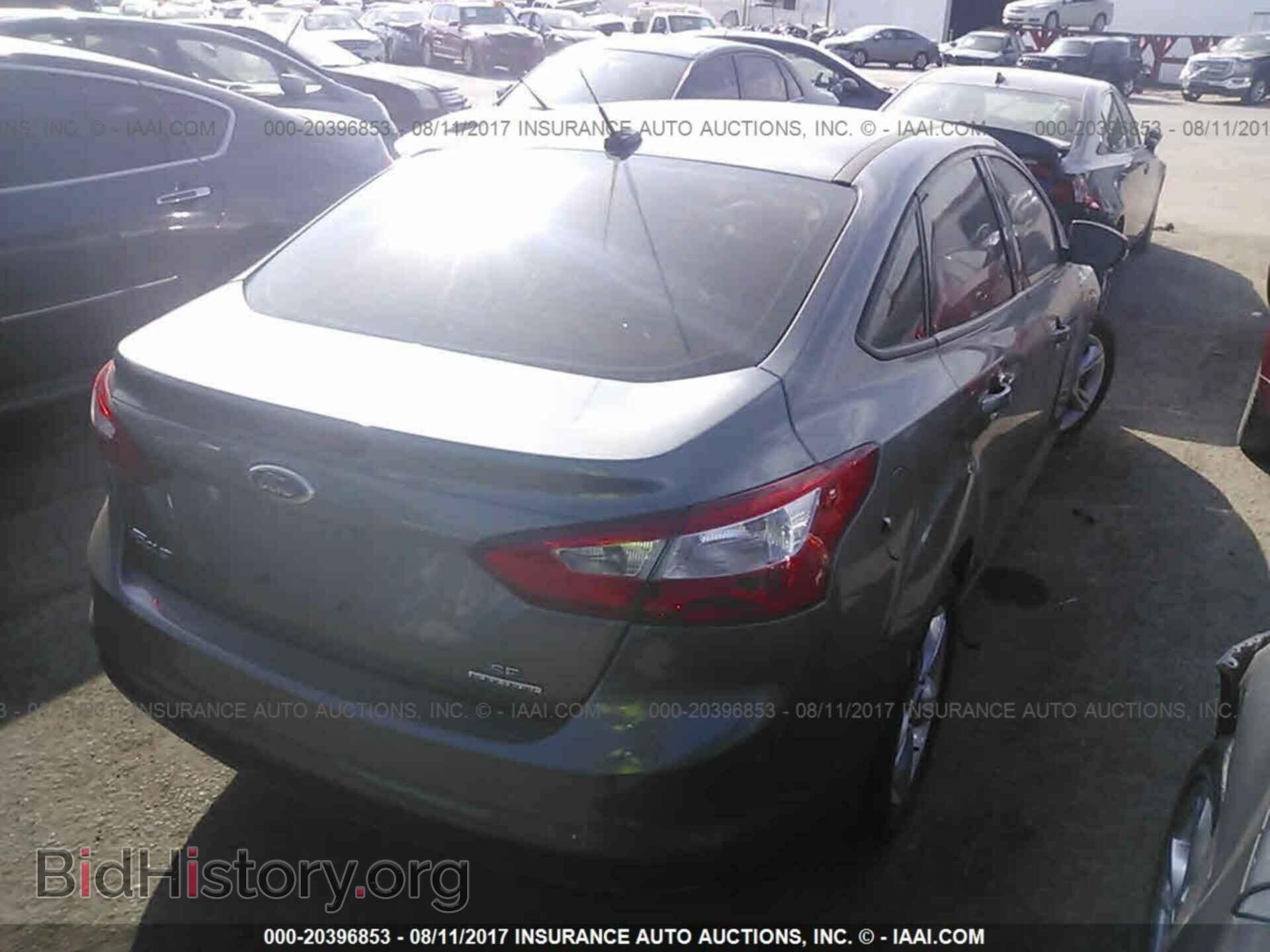 2014 Ford Focus - VIN: 1FADP3F29EL439779 - Фото 4
