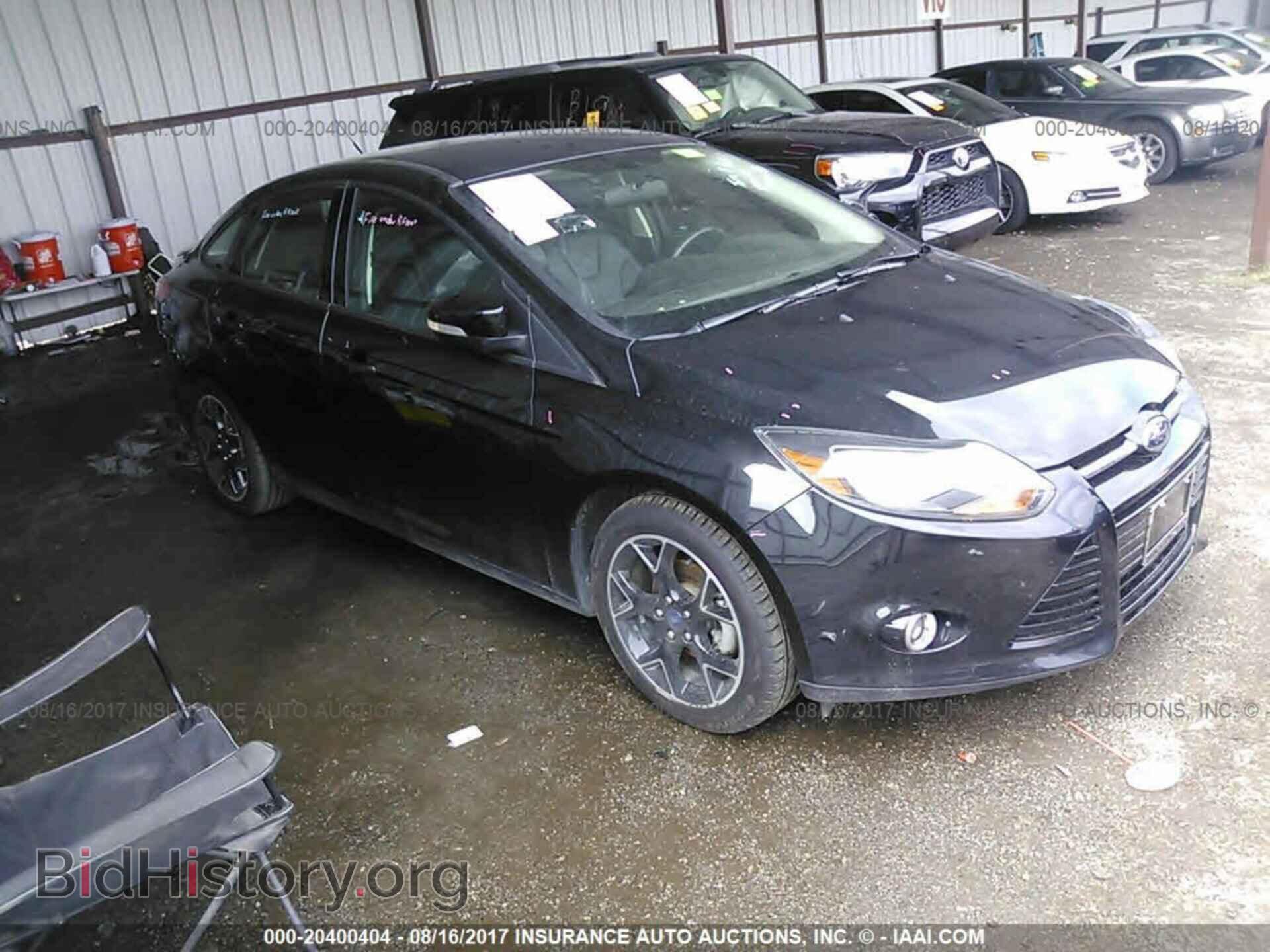 Фотография 1FADP3F25EL209995 - Ford Focus 2014