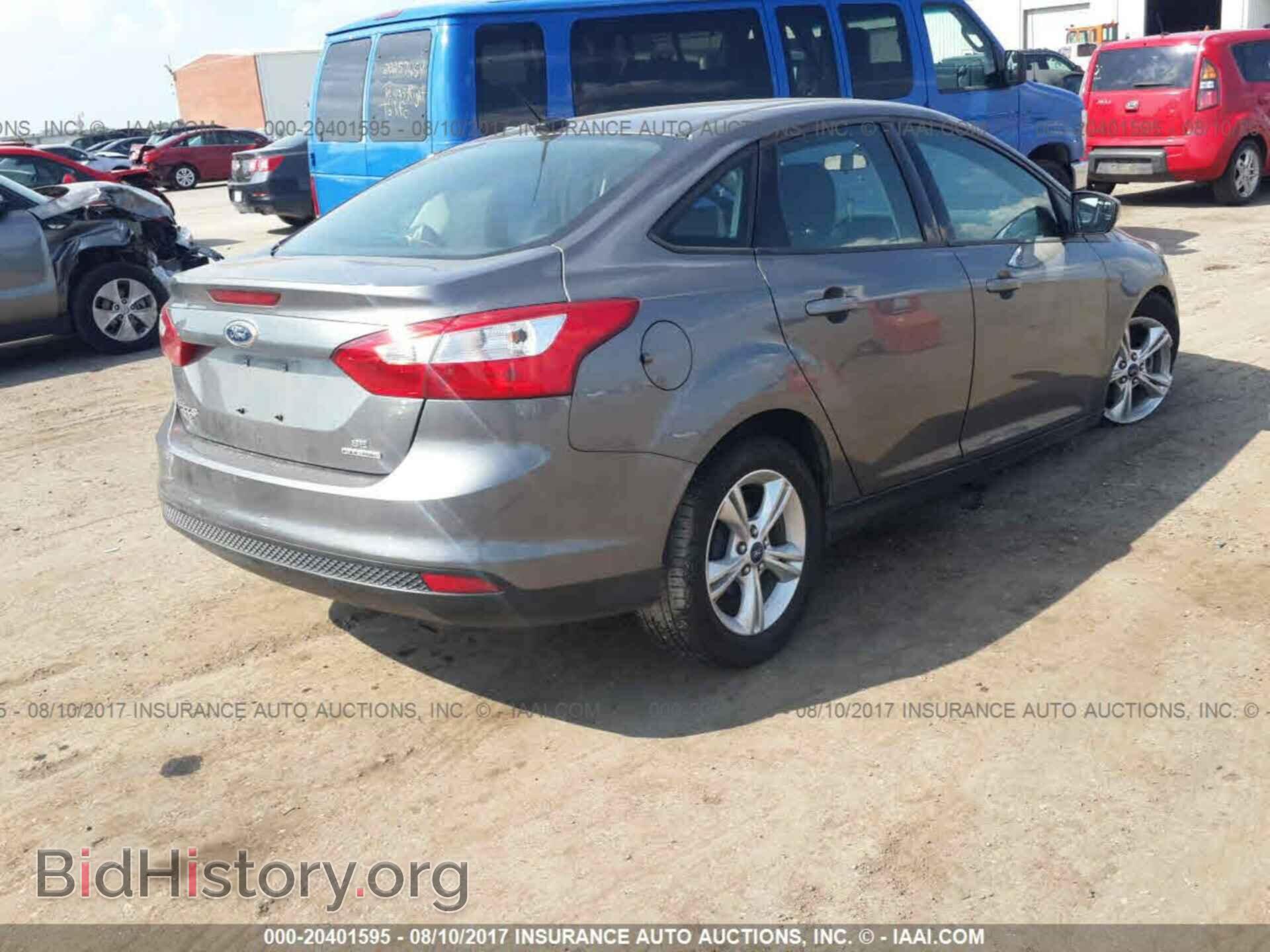 2013 Ford Focus - VIN: 1FADP3F24DL261696 - Photo 4