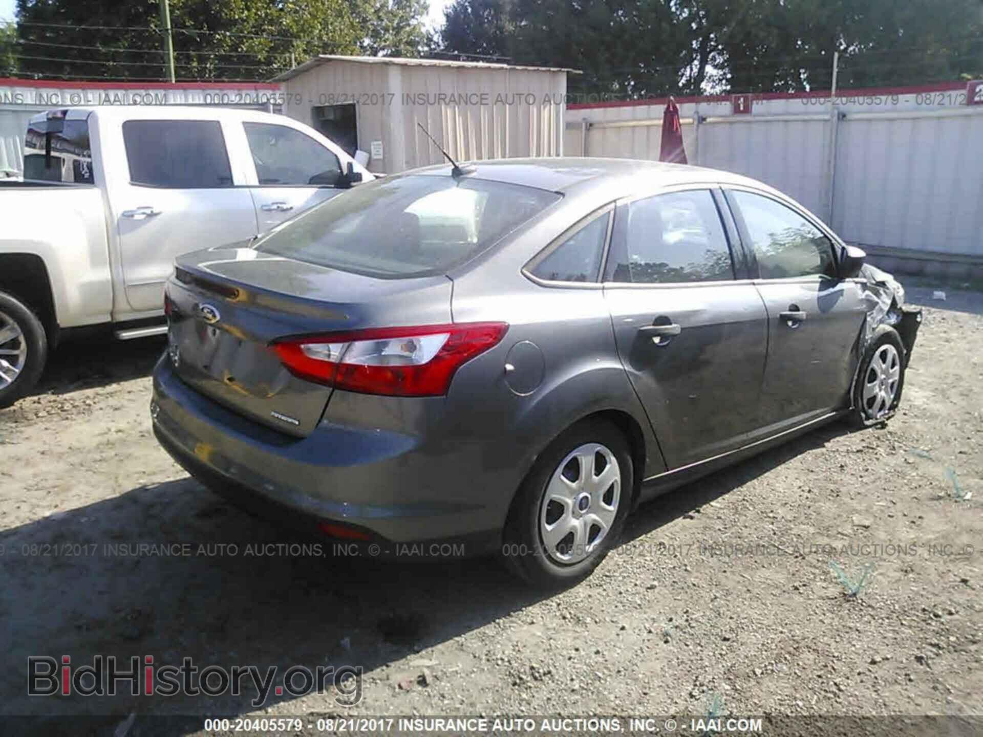 2014 Ford Focus - VIN: 1FADP3E25EL339003 - Фото 4
