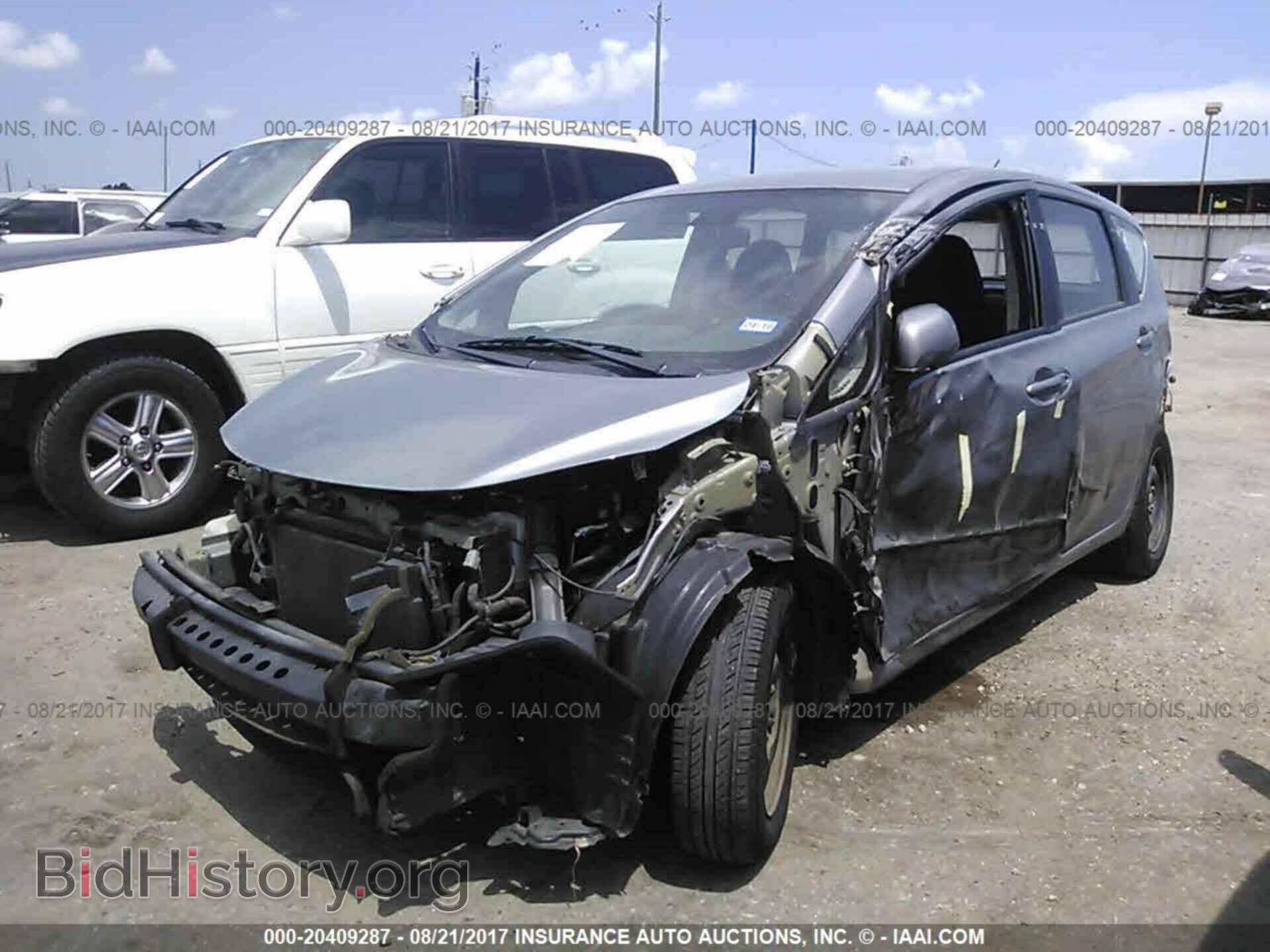 2014 Nissan Versa note - VIN: 3N1CE2CP8EL401358 - Фото 2