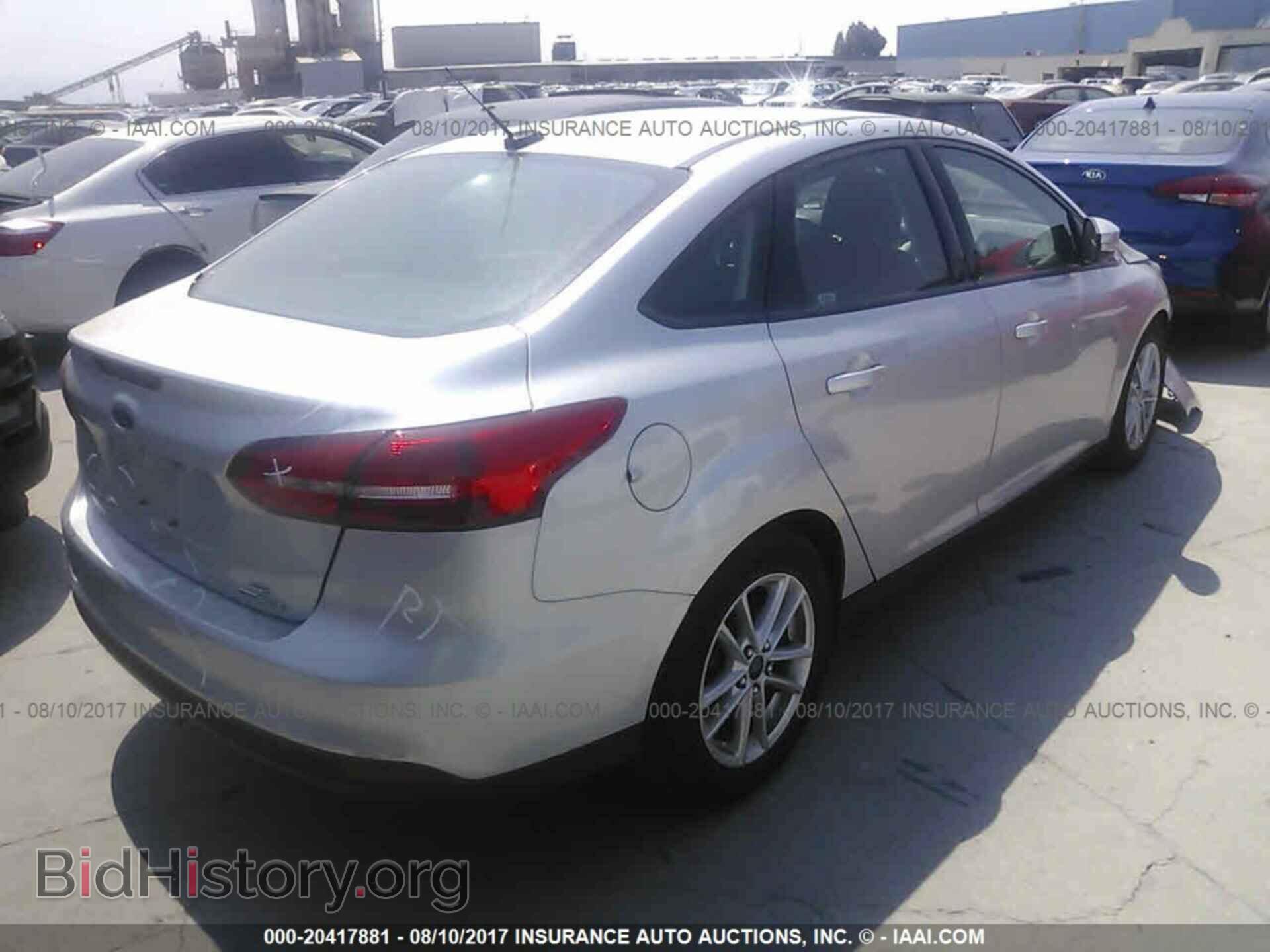 2016 Ford Focus - VIN: 1FADP3F2XGL272044 - Photo 4