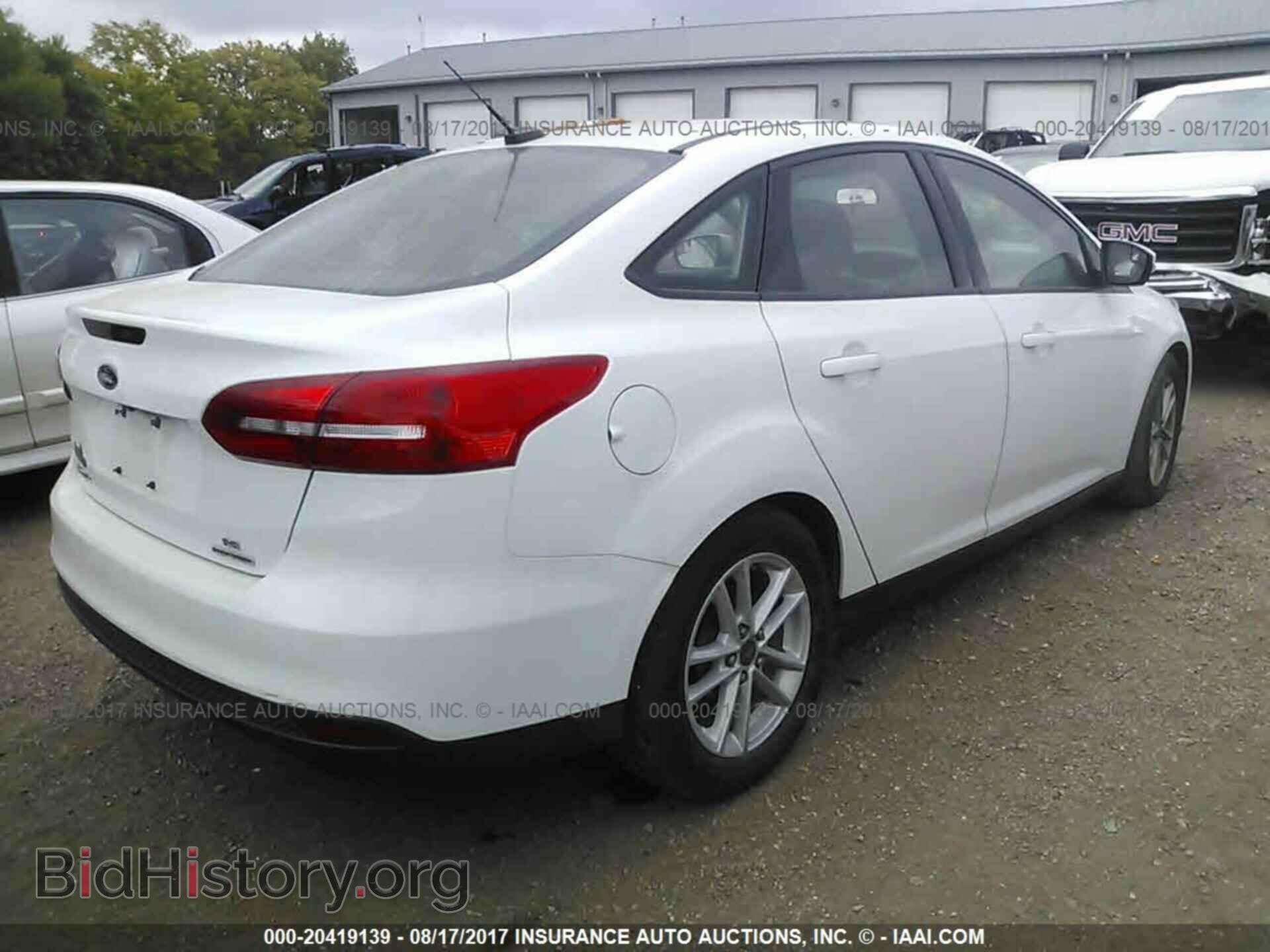 2015 Ford Focus - VIN: 1FADP3F22FL242518 - Photo 4