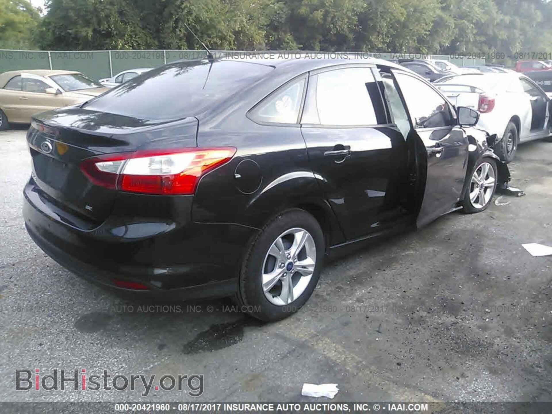 2013 Ford Focus - VIN: 1FADP3F2XDL314739 - Фото 4