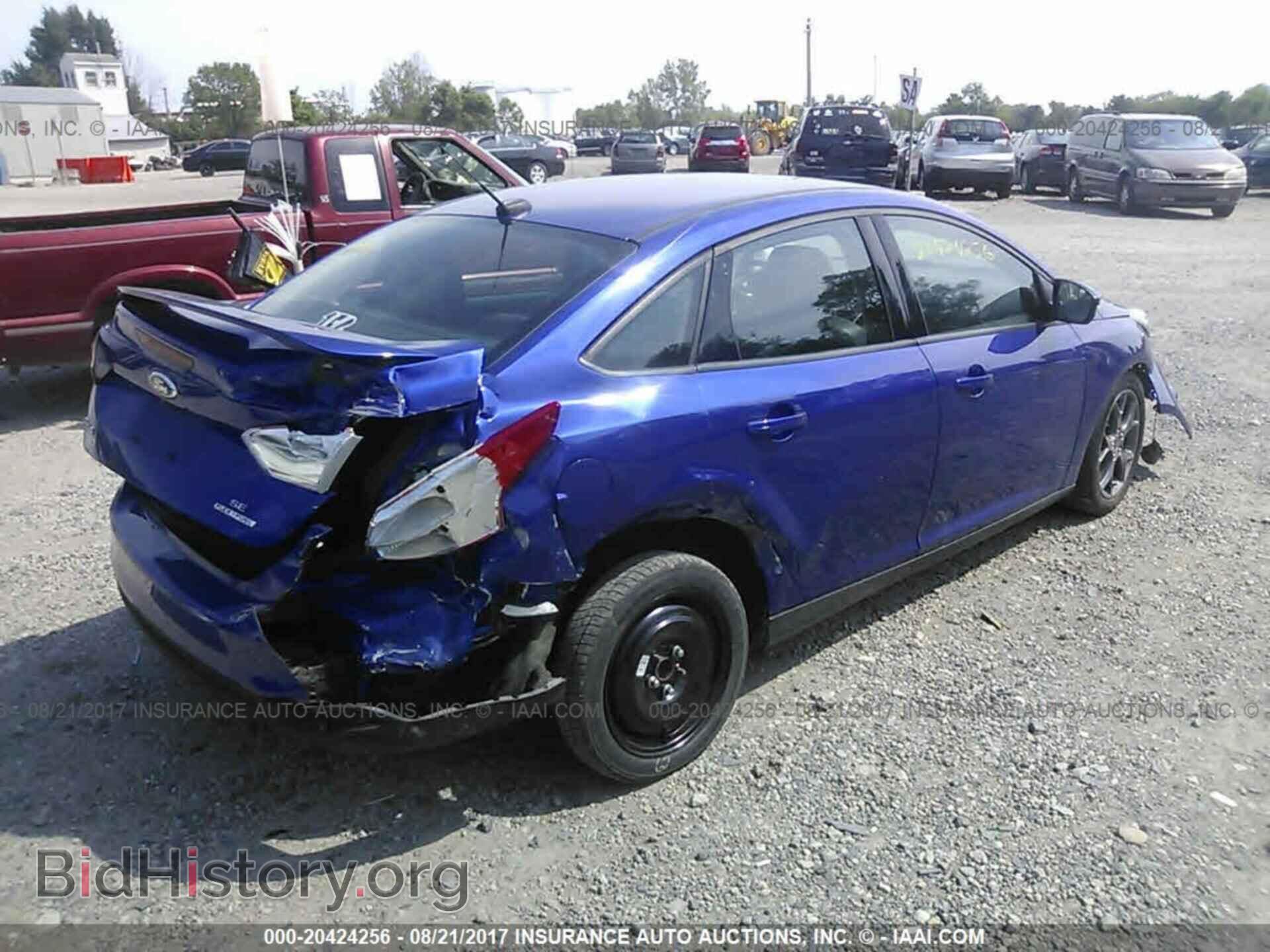 2013 Ford Focus - VIN: 1FADP3F2XDL242666 - Фото 4