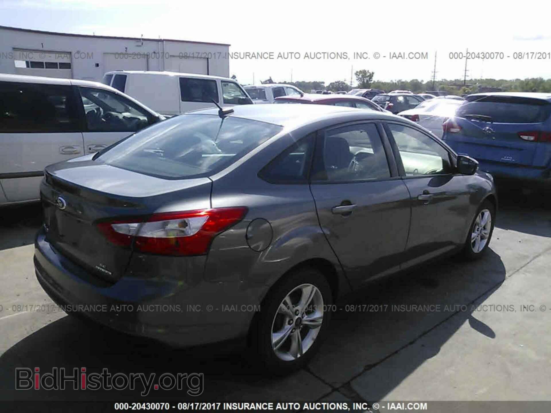 2013 Ford Focus - VIN: 1FADP3F28DL285659 - Photo 4