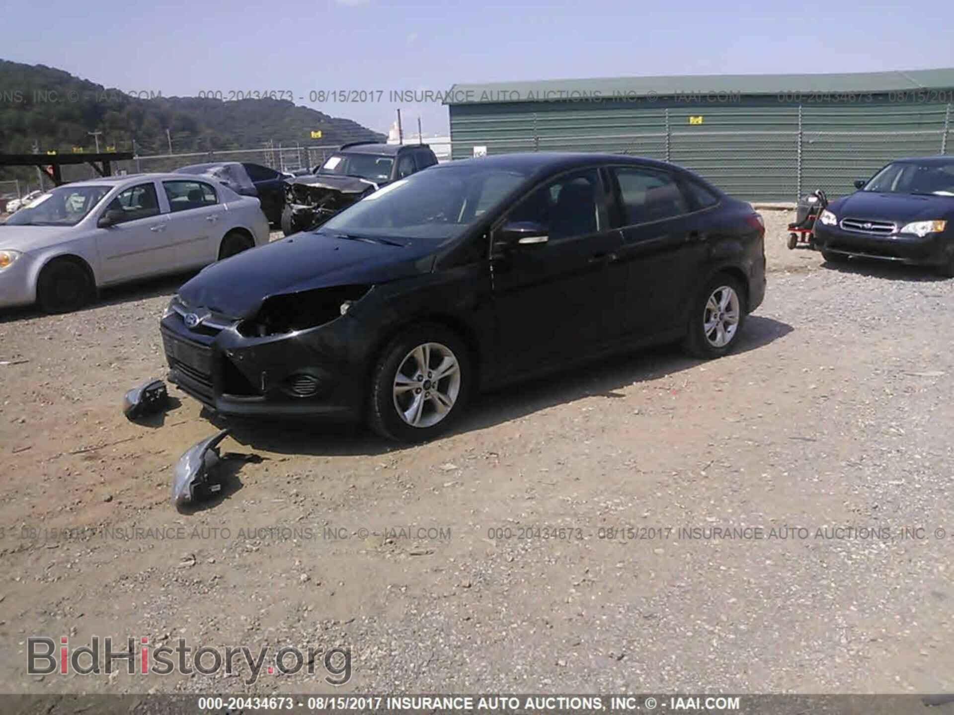 2013 Ford Focus - VIN: 1FADP3F21DL354966 - Фото 2
