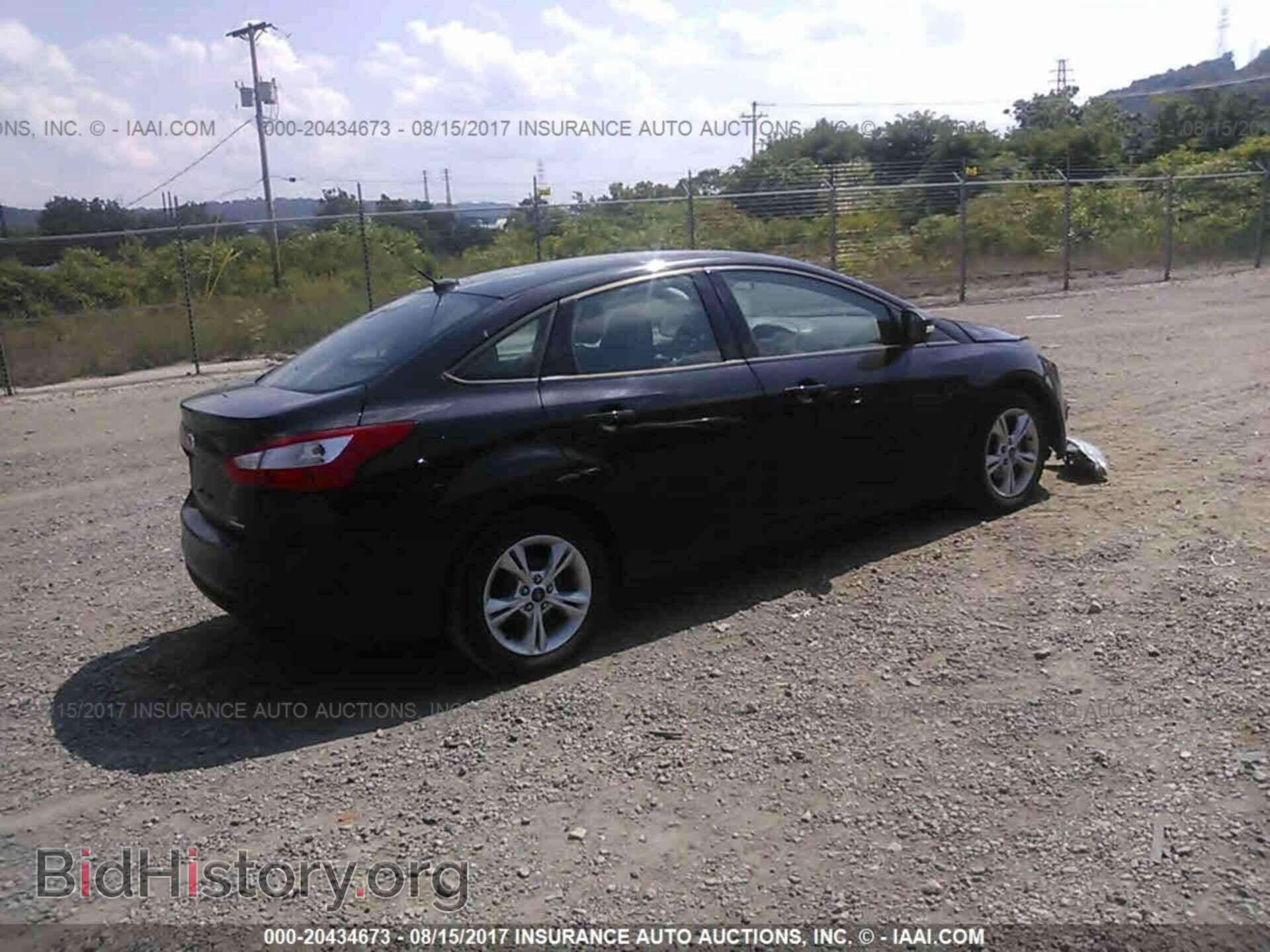 2013 Ford Focus - VIN: 1FADP3F21DL354966 - Фото 4