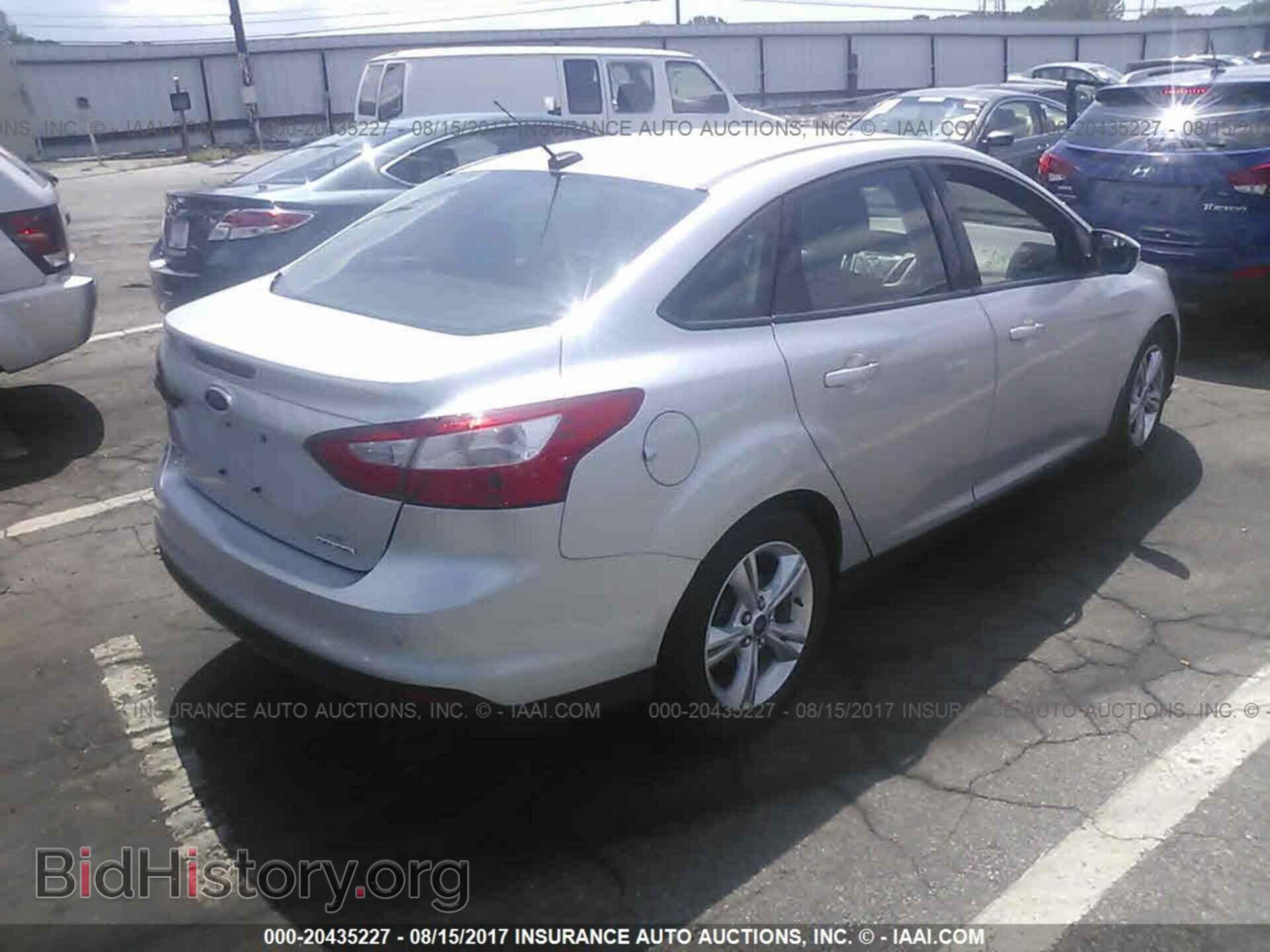 2014 Ford Focus - VIN: 1FADP3F20EL296110 - Photo 4