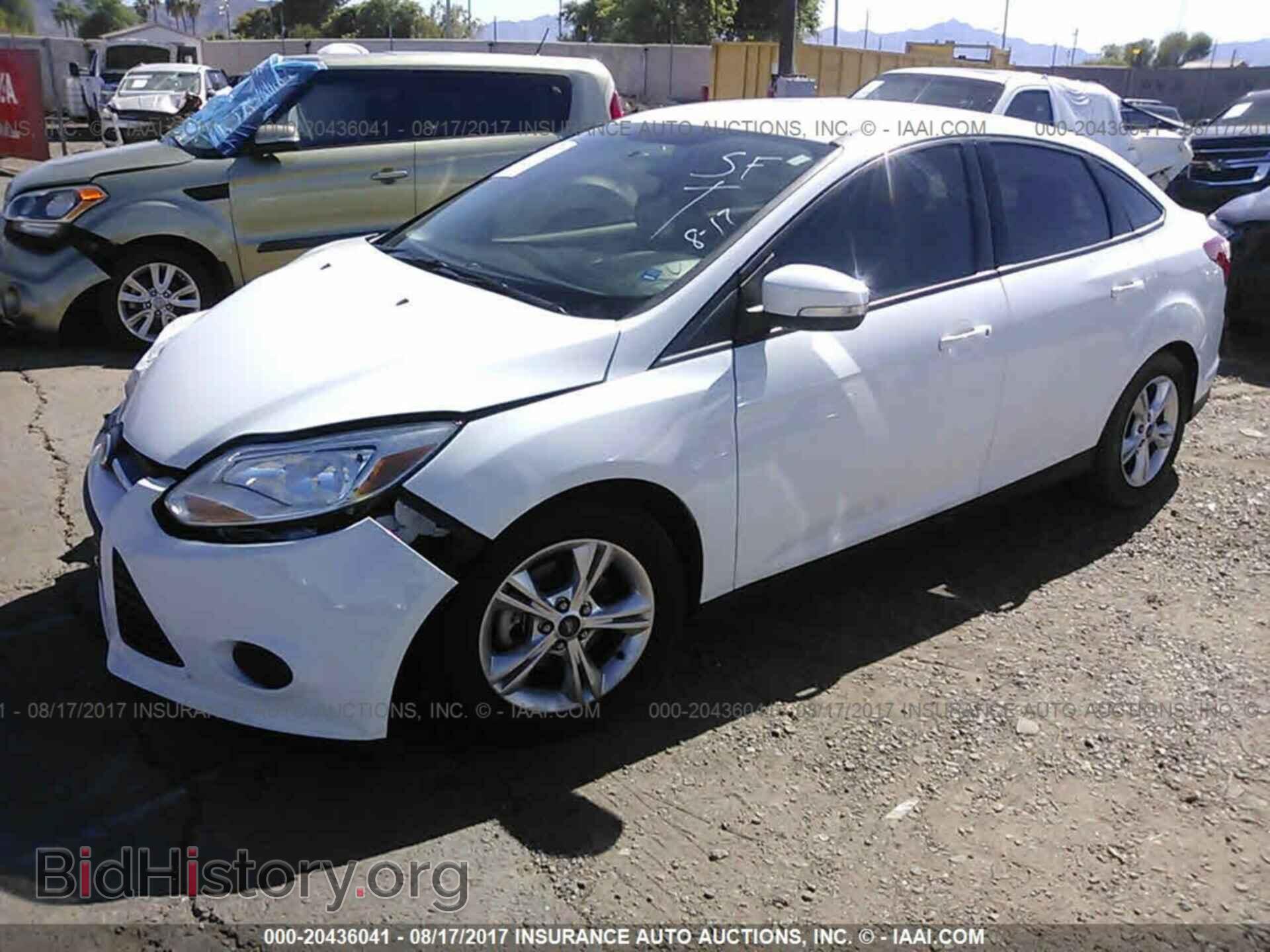 2014 Ford Focus - VIN: 1FADP3F20EL287195 - Фото 2
