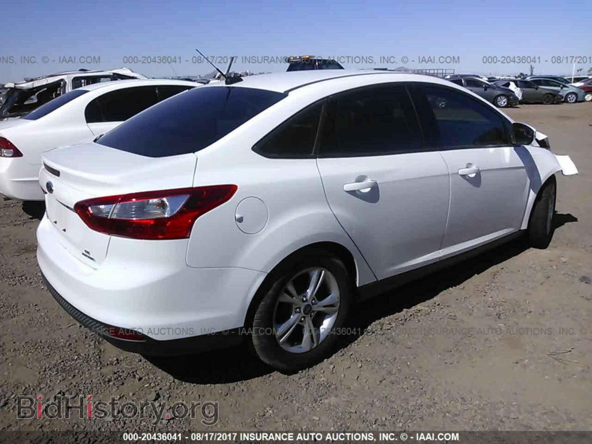 2014 Ford Focus - VIN: 1FADP3F20EL287195 - Фото 4