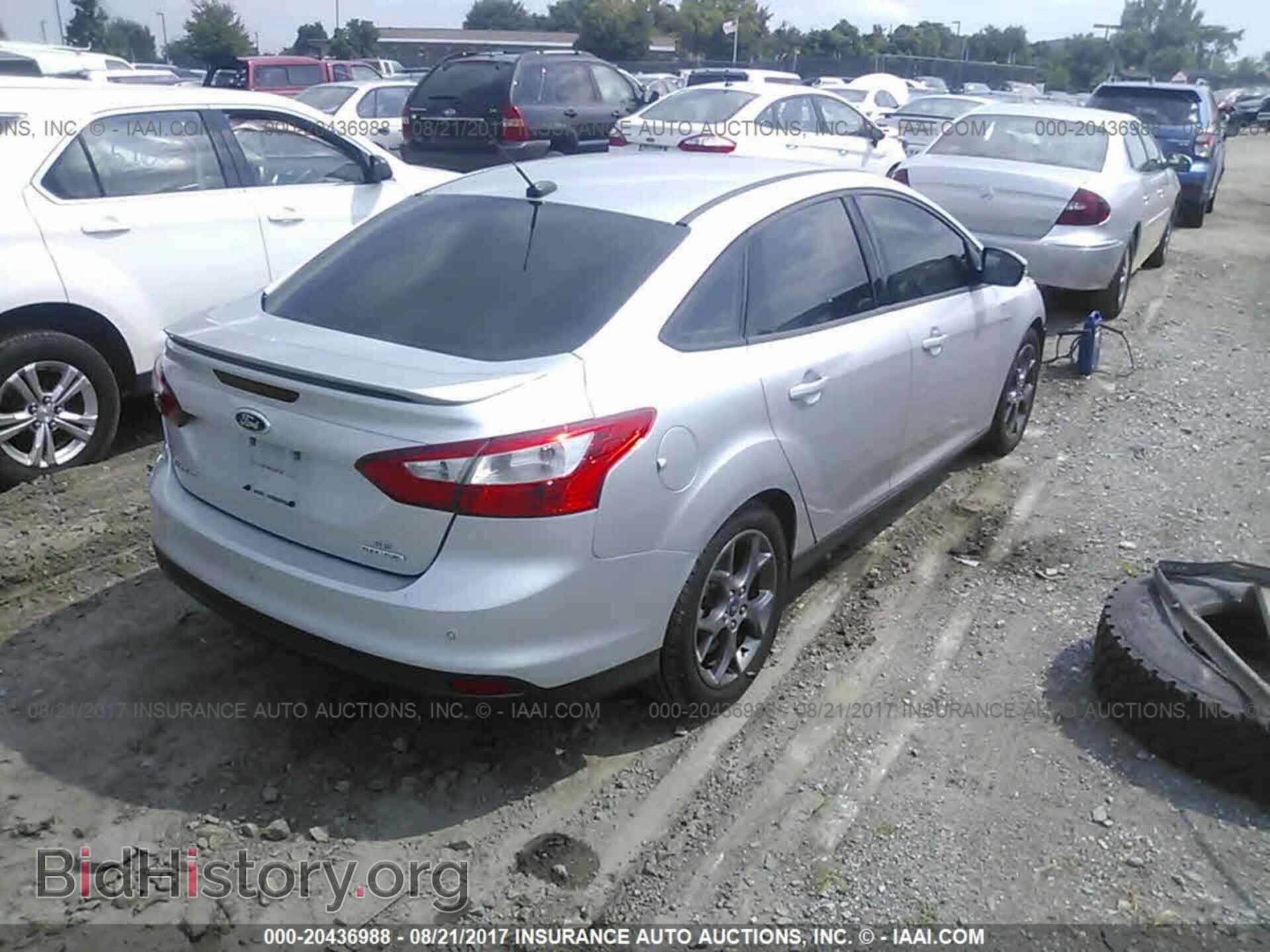 2013 Ford Focus - VIN: 1FADP3F24DL107957 - Фото 4