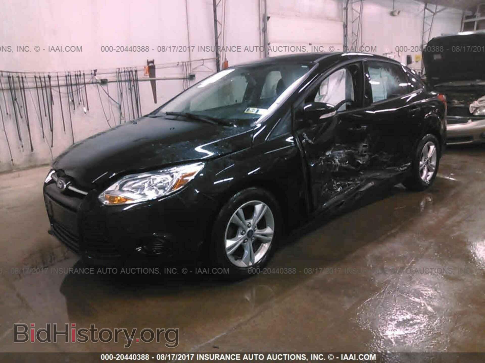 2014 Ford Focus - VIN: 1FADP3F21EL320317 - Photo 2