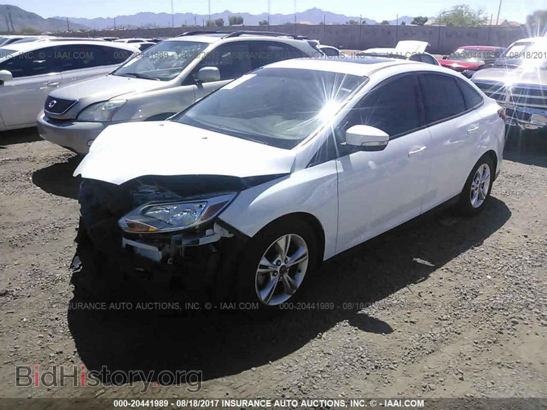 2014 Ford Focus - VIN: 1FADP3F28EL317561 - Фото 2
