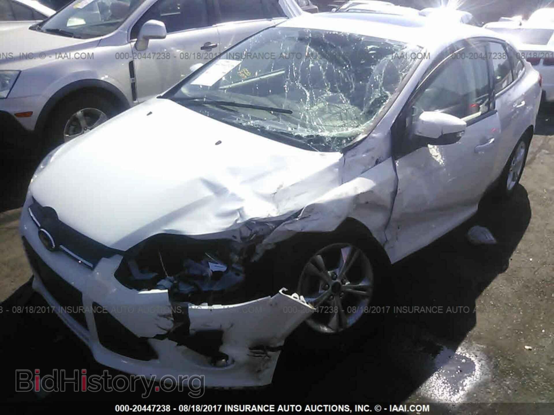 2014 Ford Focus - VIN: 1FADP3F26EL317901 - Фото 2