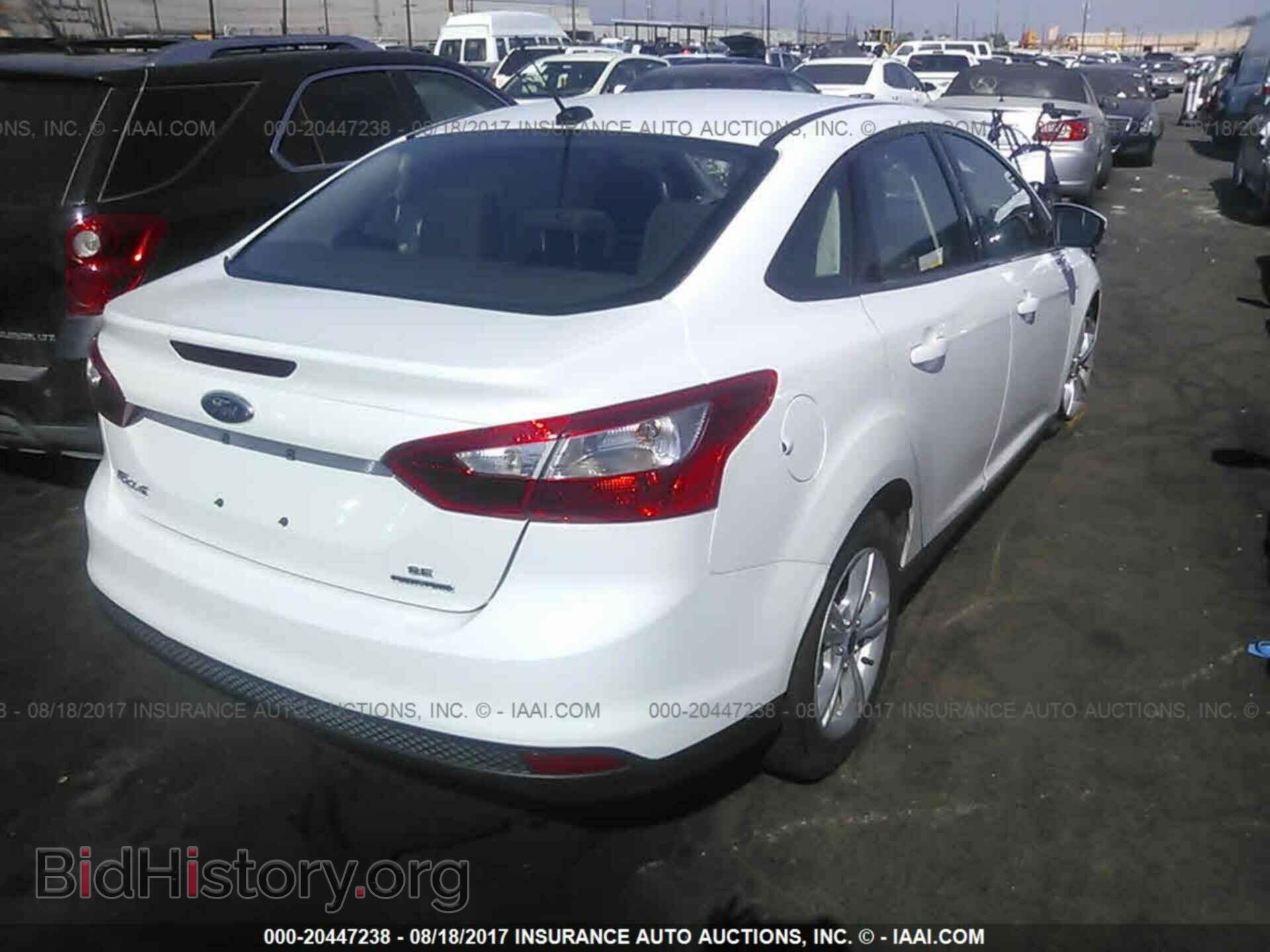 2014 Ford Focus - VIN: 1FADP3F26EL317901 - Фото 4