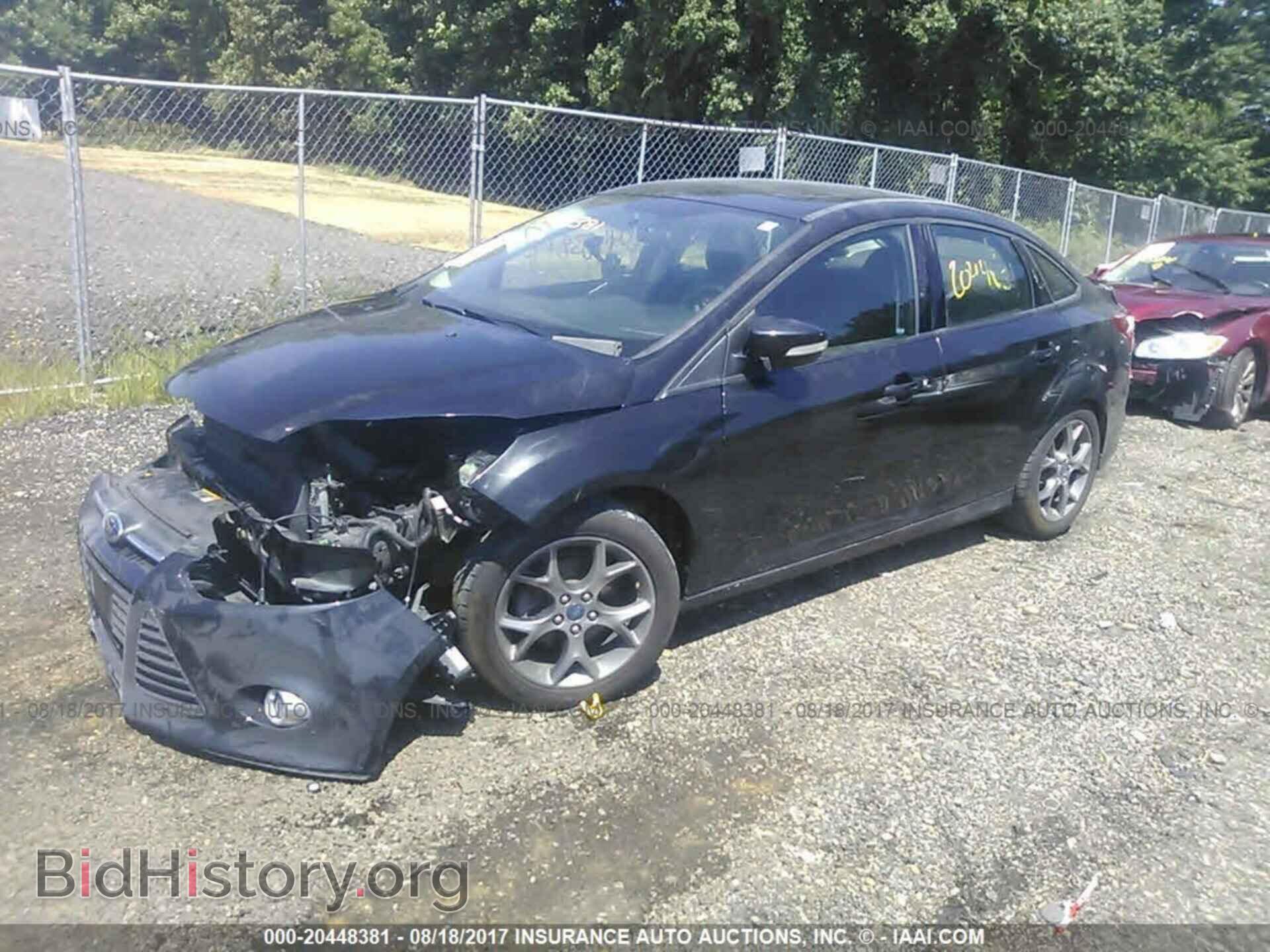 2014 Ford Focus - VIN: 1FADP3F22EL121891 - Photo 2