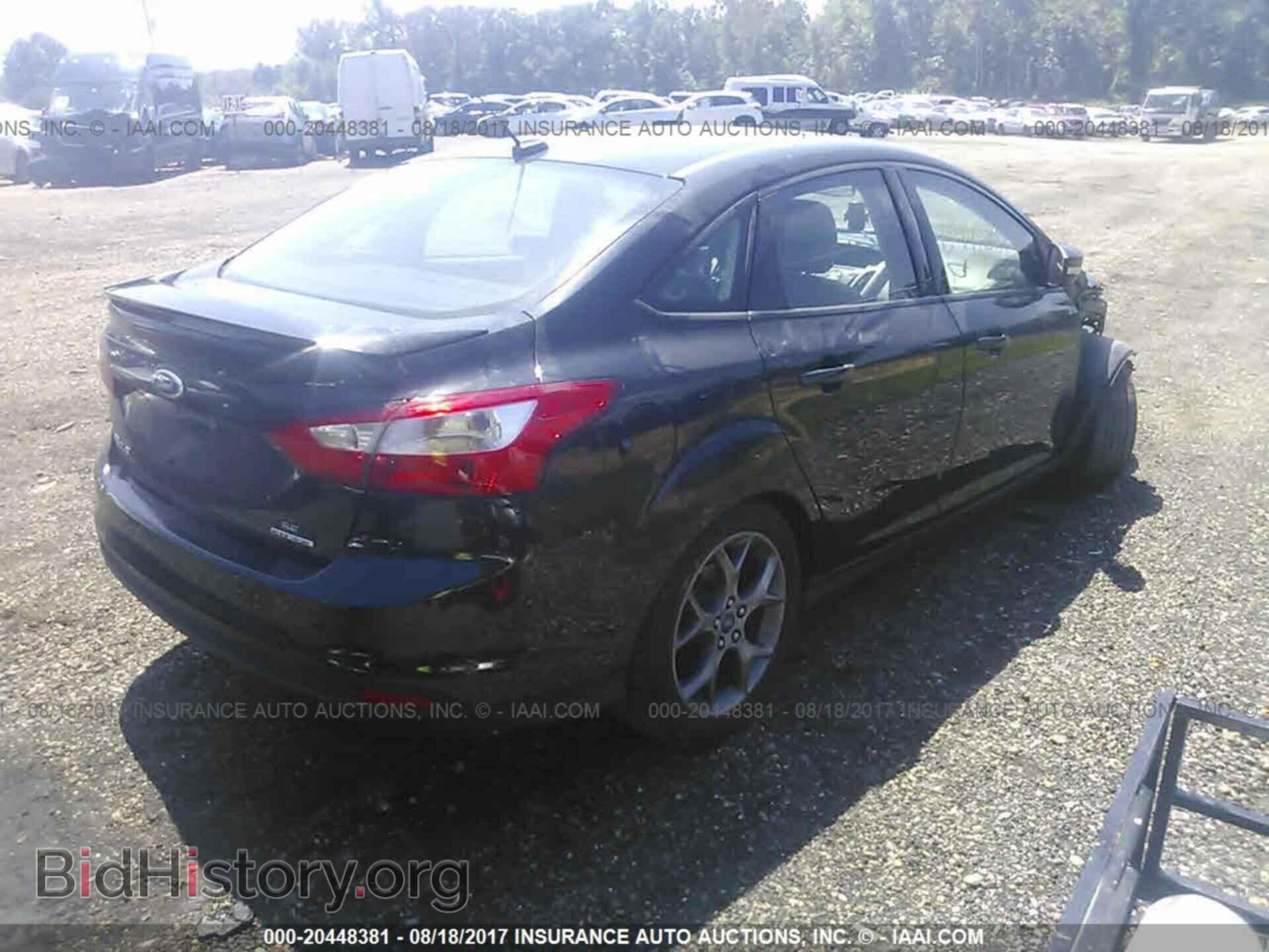 2014 Ford Focus - VIN: 1FADP3F22EL121891 - Photo 4