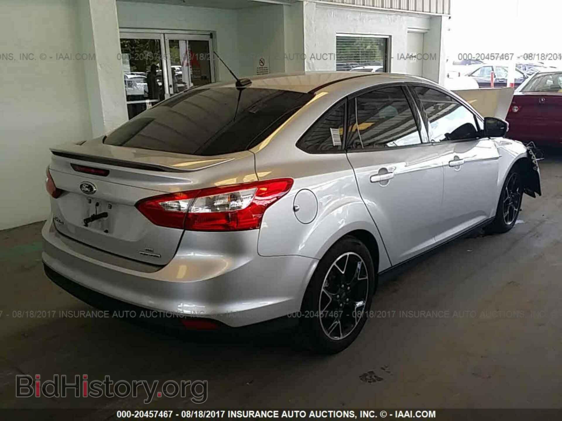 2014 Ford Focus - VIN: 1FADP3F2XEL309560 - Photo 4