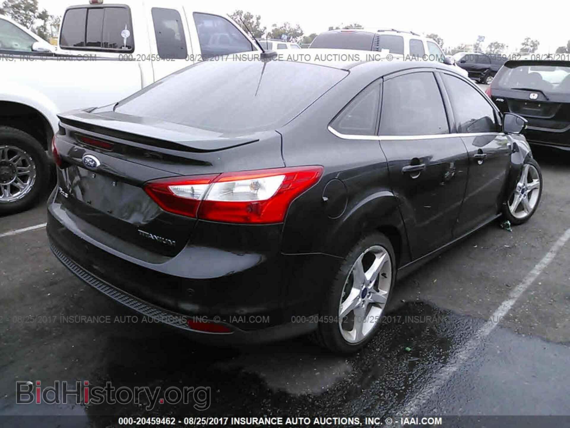2014 Ford Focus - VIN: 1FADP3J23EL287084 - Photo 4
