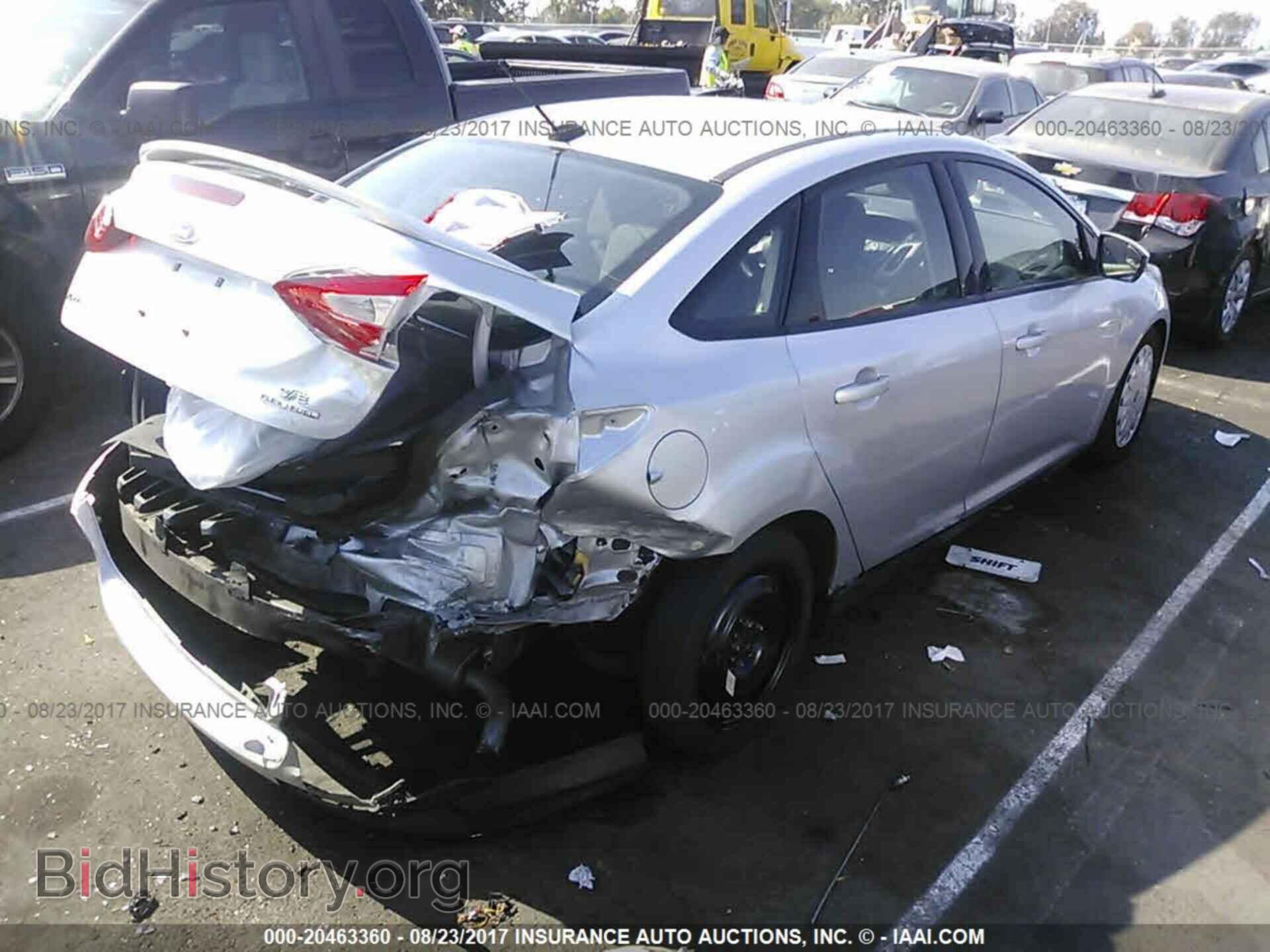 2014 Ford Focus - VIN: 1FADP3F22EL210165 - Фото 4