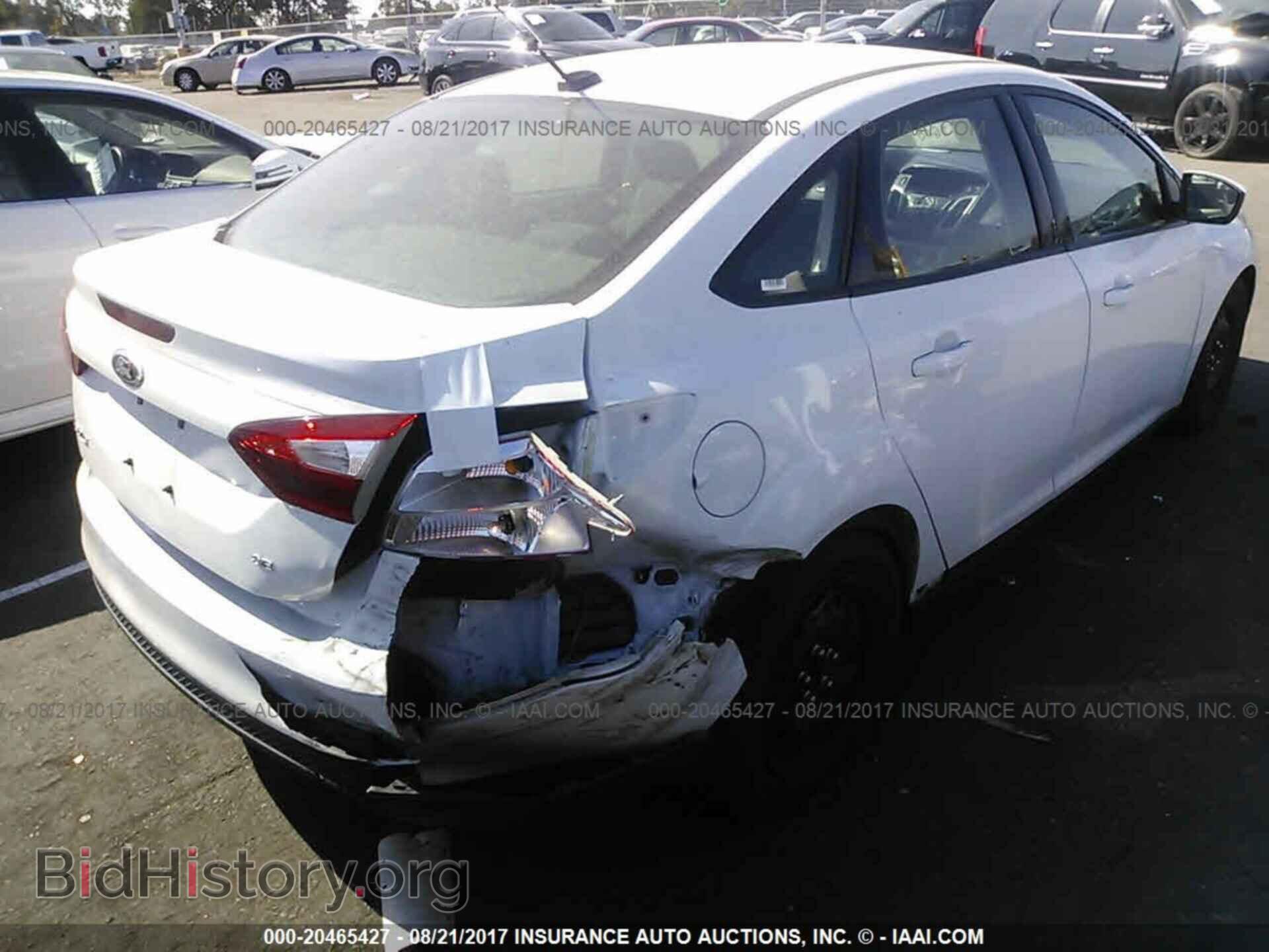 2012 Ford Focus - VIN: 1FAHP3F26CL454948 - Photo 4