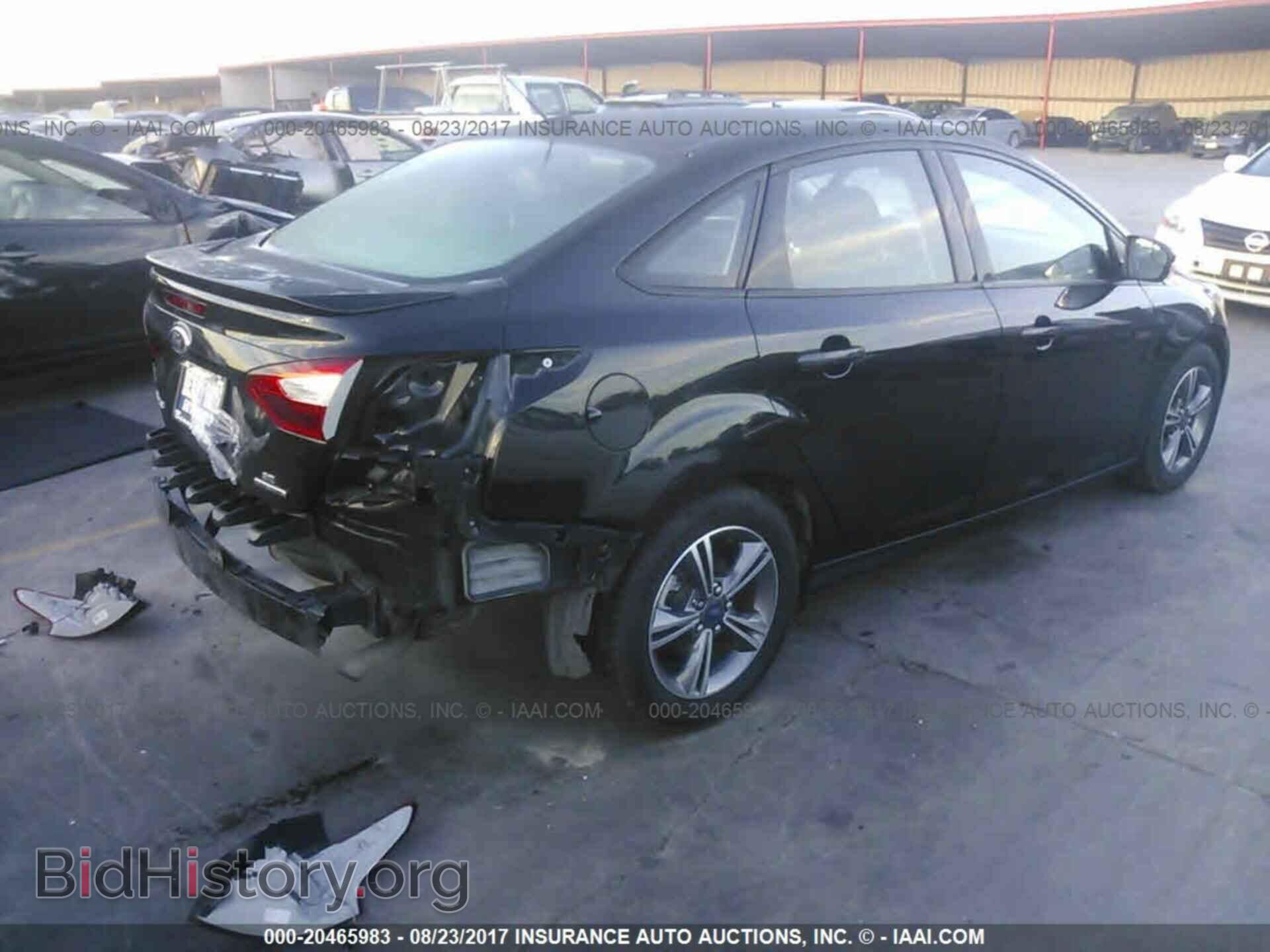 2014 Ford Focus - VIN: 1FADP3F21EL460223 - Фото 4