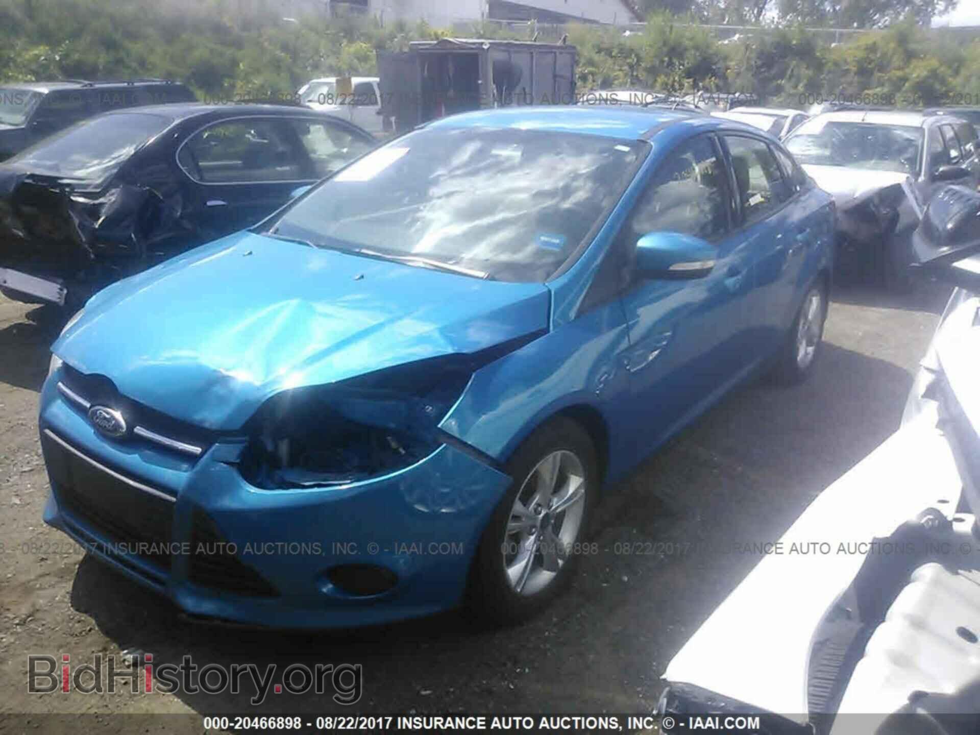 2014 Ford Focus - VIN: 1FADP3F29EL201396 - Фото 2