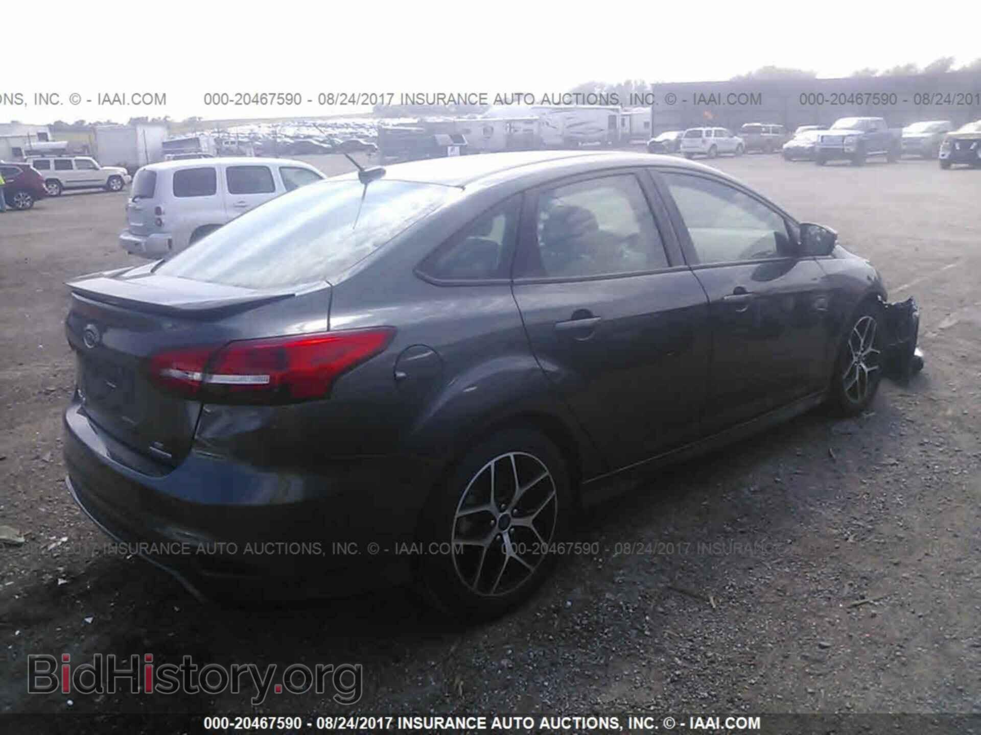 2016 Ford Focus - VIN: 1FADP3F24GL281743 - Photo 4
