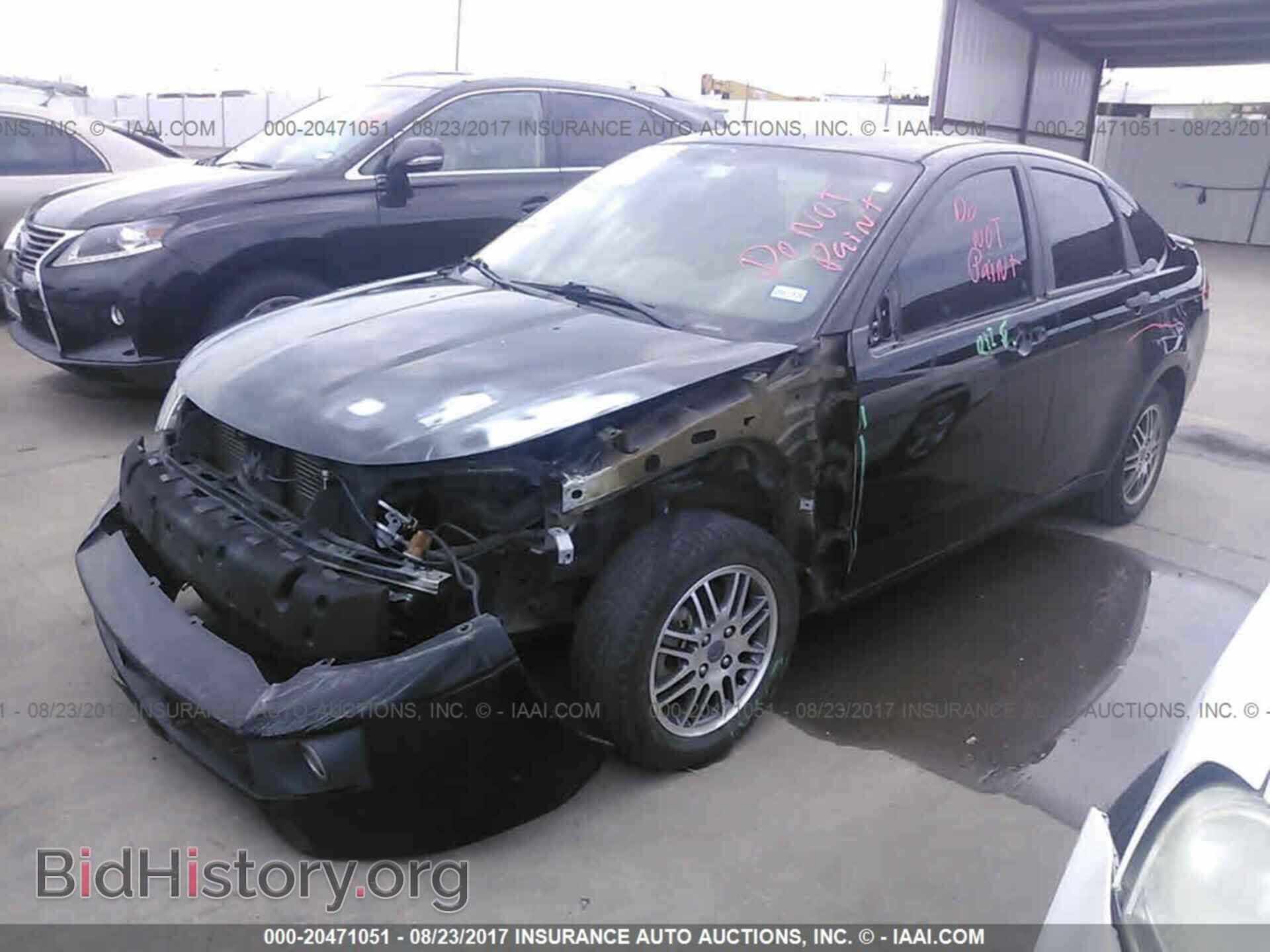 2011 Ford Focus - VIN: 1FAHP3FN5BW202048 - Photo 2