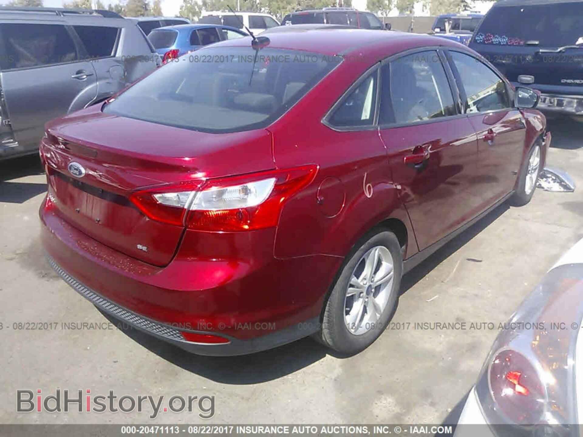 2014 Ford Focus - VIN: 1FADP3F29EL407799 - Photo 4