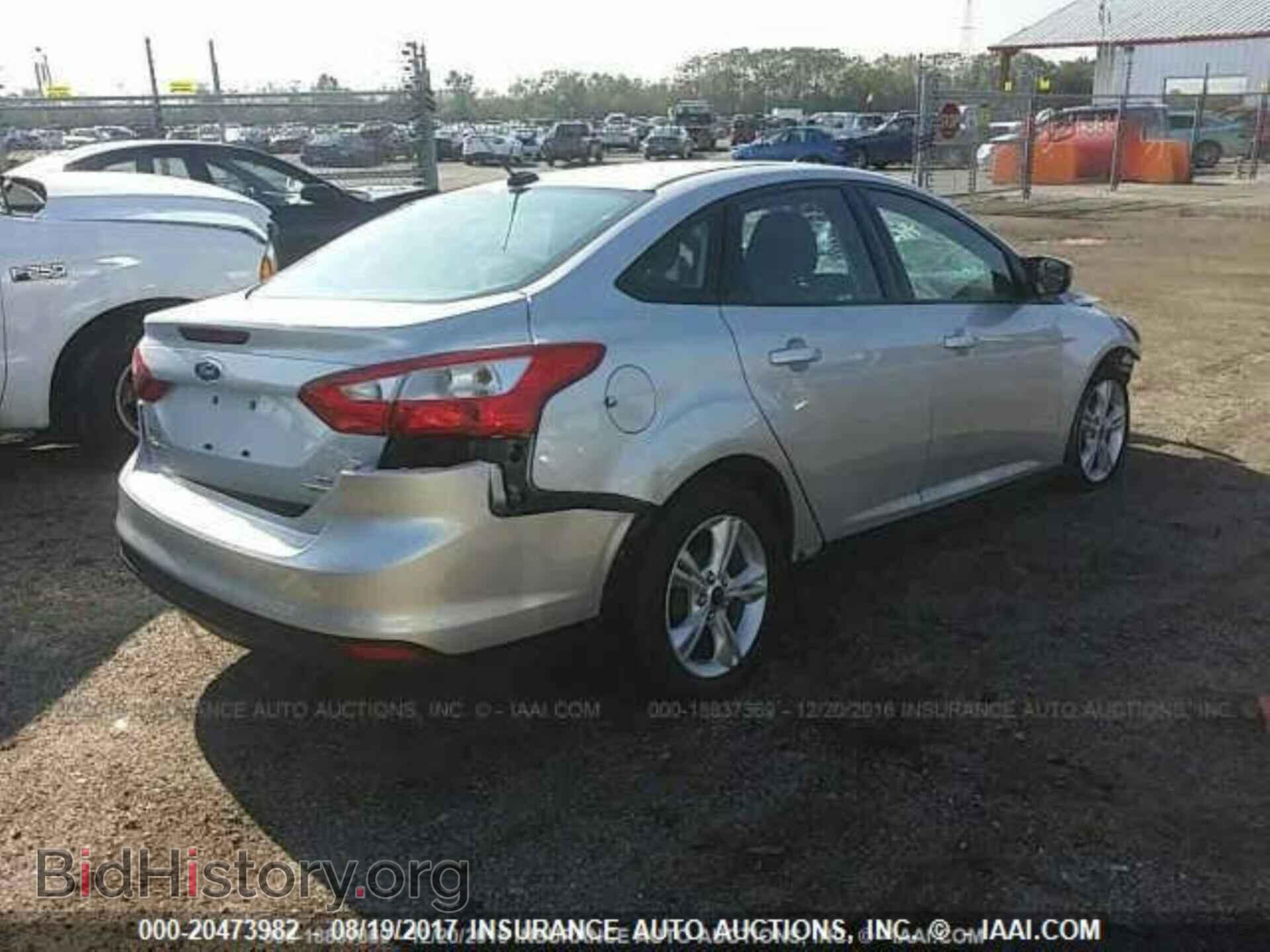 2014 Ford Focus - VIN: 1FADP3F21EL203384 - Фото 4