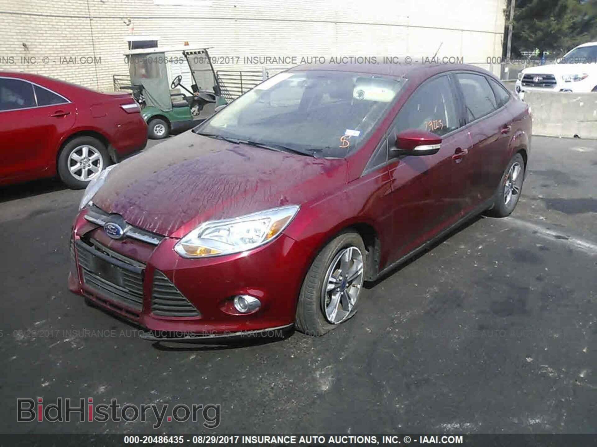 2014 Ford Focus - VIN: 1FADP3F21EL440098 - Фото 2