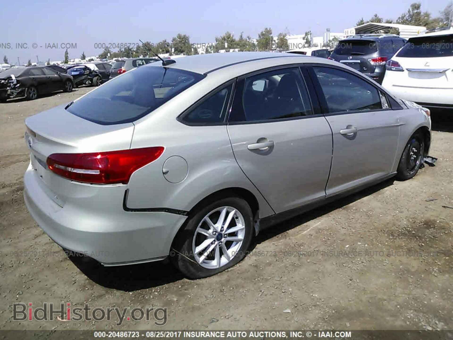 2015 Ford Focus - VIN: 1FADP3F2XFL307955 - Photo 4