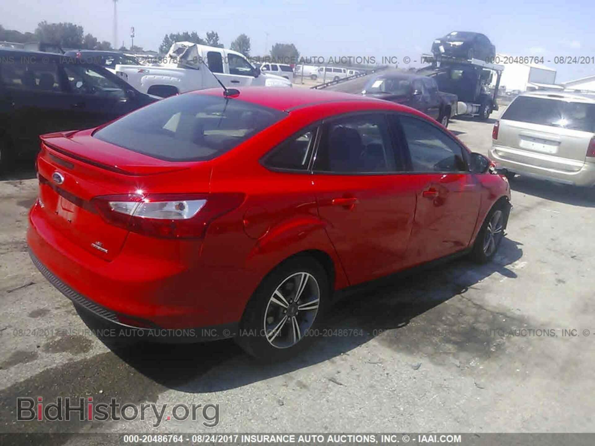 2014 Ford Focus - VIN: 1FADP3F28EL405929 - Фото 4