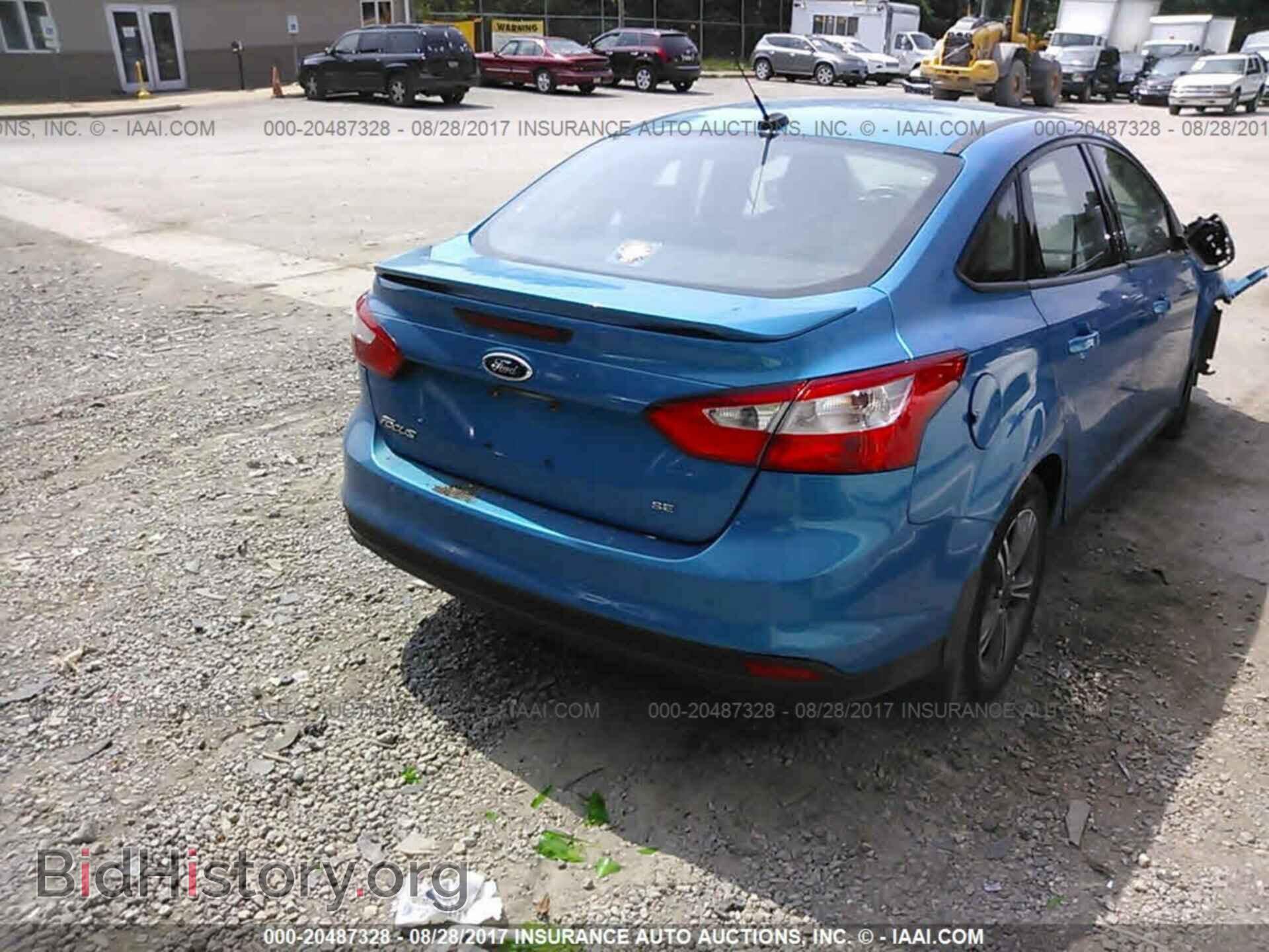 2014 Ford Focus - VIN: 1FADP3F21EL339918 - Photo 4