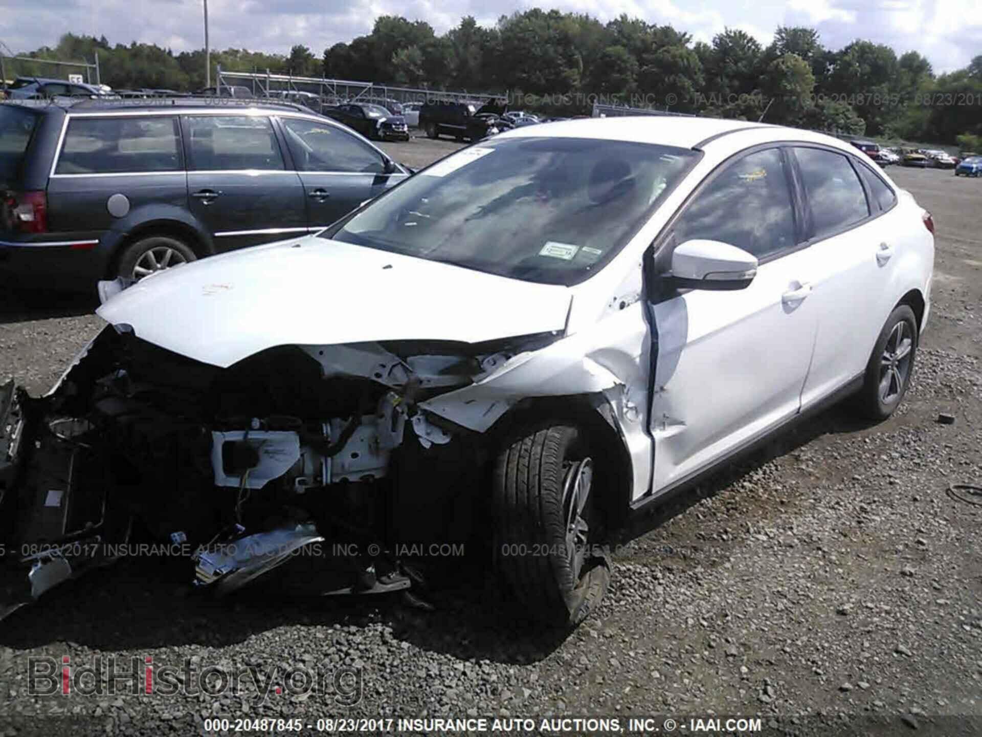2014 Ford Focus - VIN: 1FADP3F21EL315697 - Фото 2