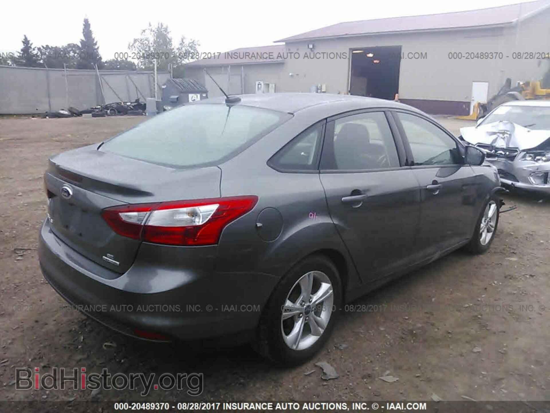 2014 Ford Focus - VIN: 1FADP3F22EL216774 - Фото 4