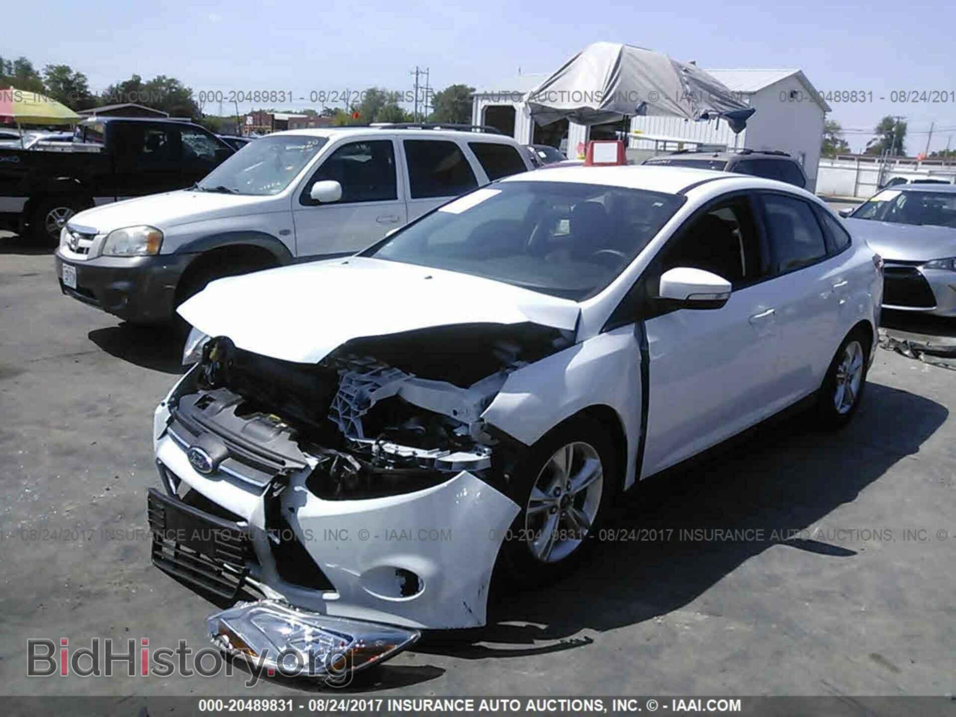 2014 Ford Focus - VIN: 1FADP3F20EL109822 - Photo 2