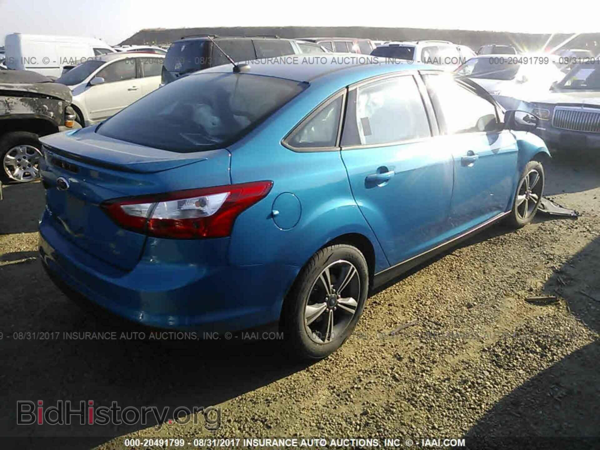 2014 Ford Focus - VIN: 1FADP3F23EL363914 - Фото 4