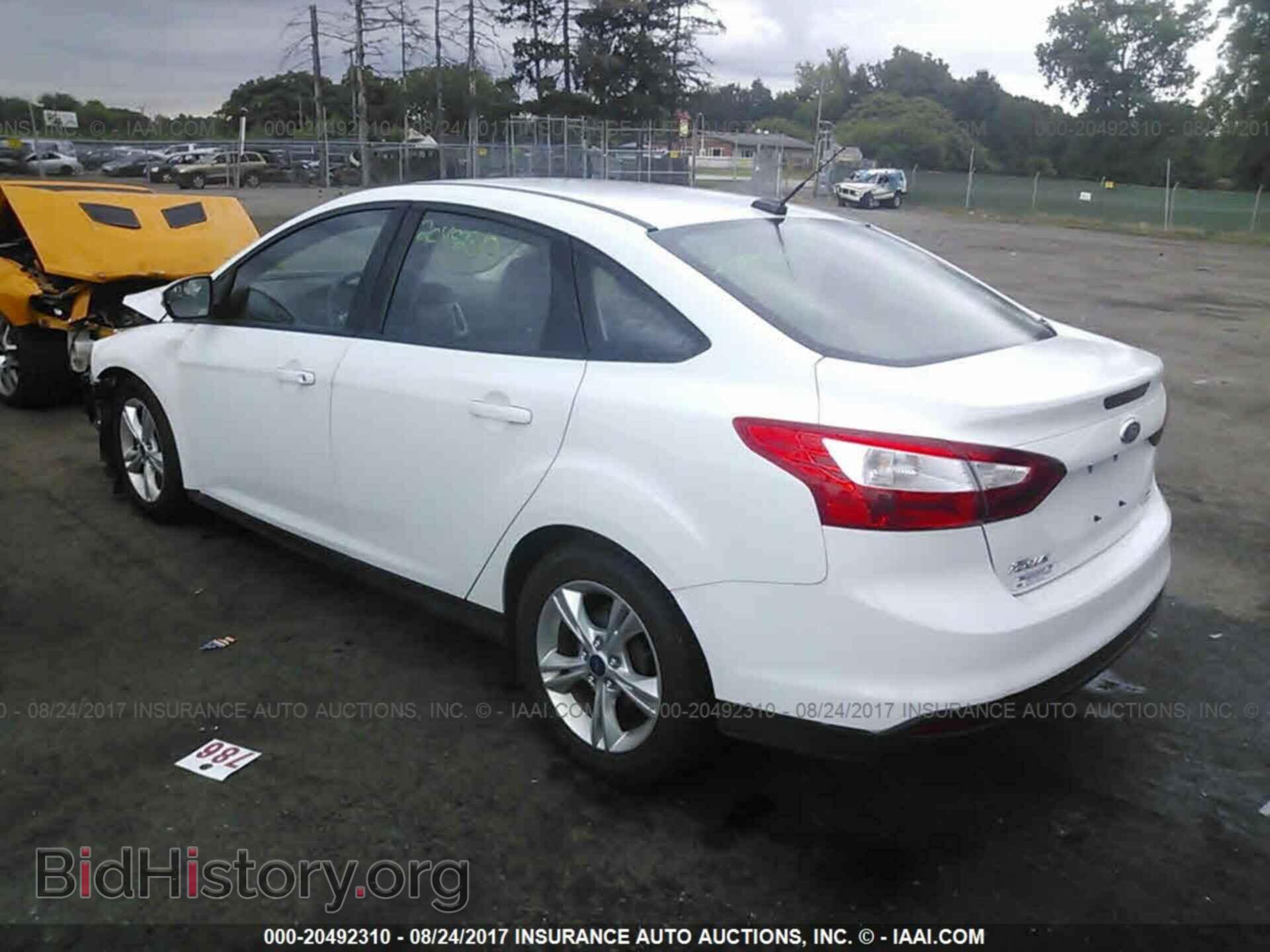 2014 Ford Focus - VIN: 1FADP3F20EL261146 - Фото 3