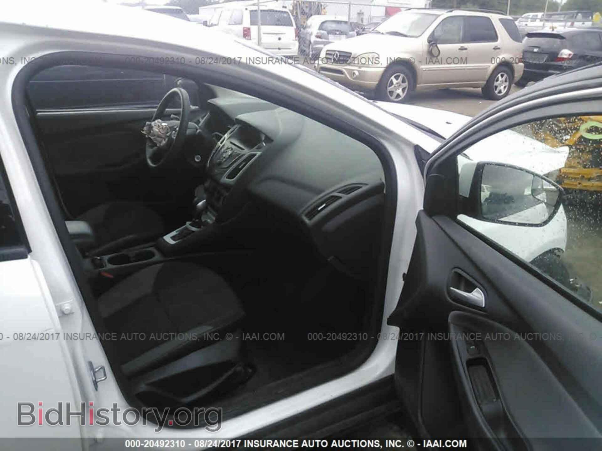 2014 Ford Focus - VIN: 1FADP3F20EL261146 - Фото 5